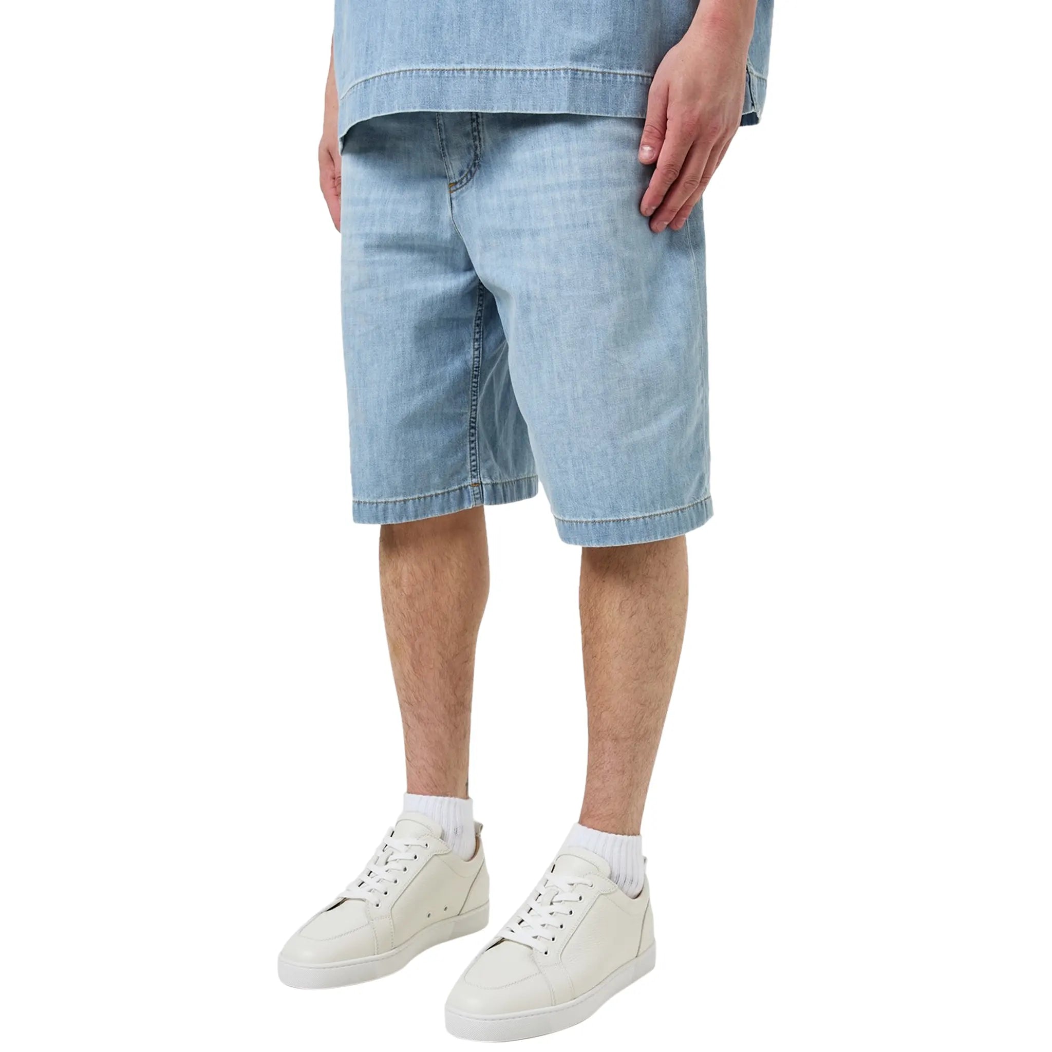 Model side view of Christian Louboutin Rantulow Flat White Grain