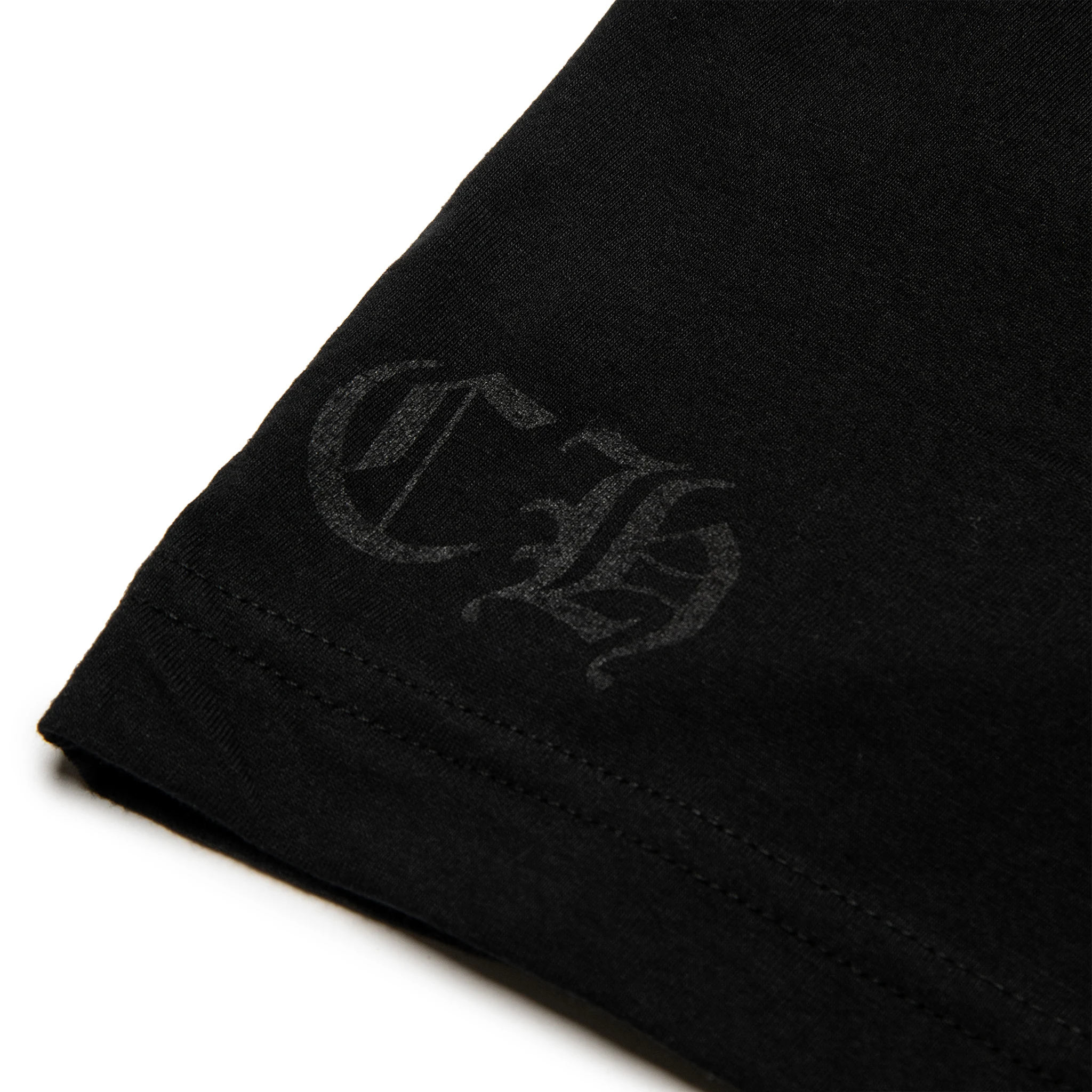 Sleeve view of Chrome Hearts Manchester Exclusive Horse Shoe Pocket Logo Black T Shirt