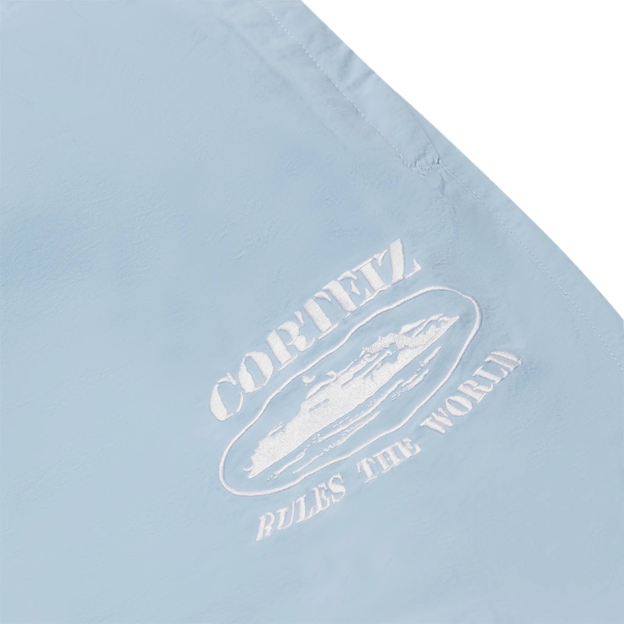 Detail view of Corteiz Shukushuku Baby Blue Tracksuit