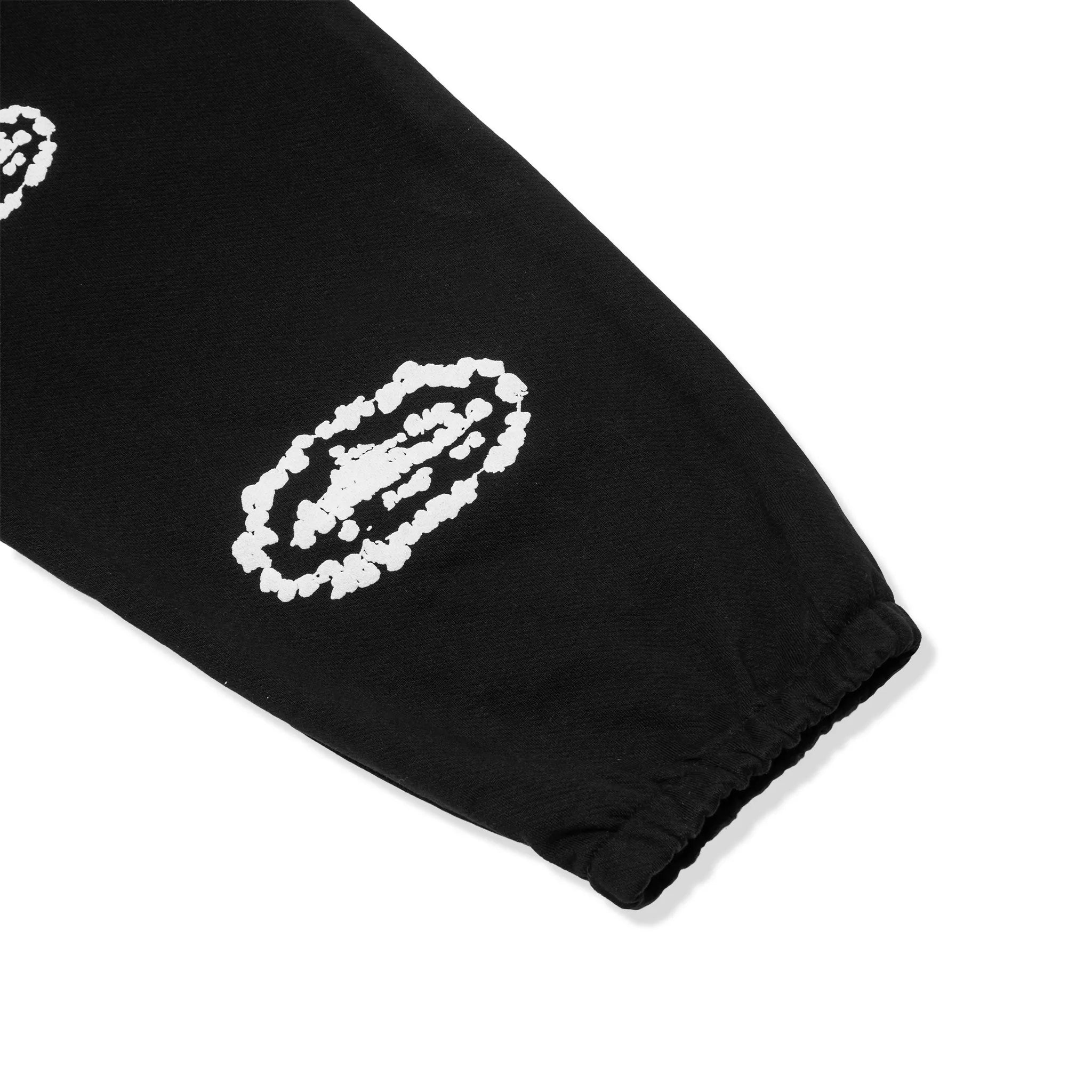 Detailed View of Corteiz x Denim Tears Island Wreath Black Sweatpants