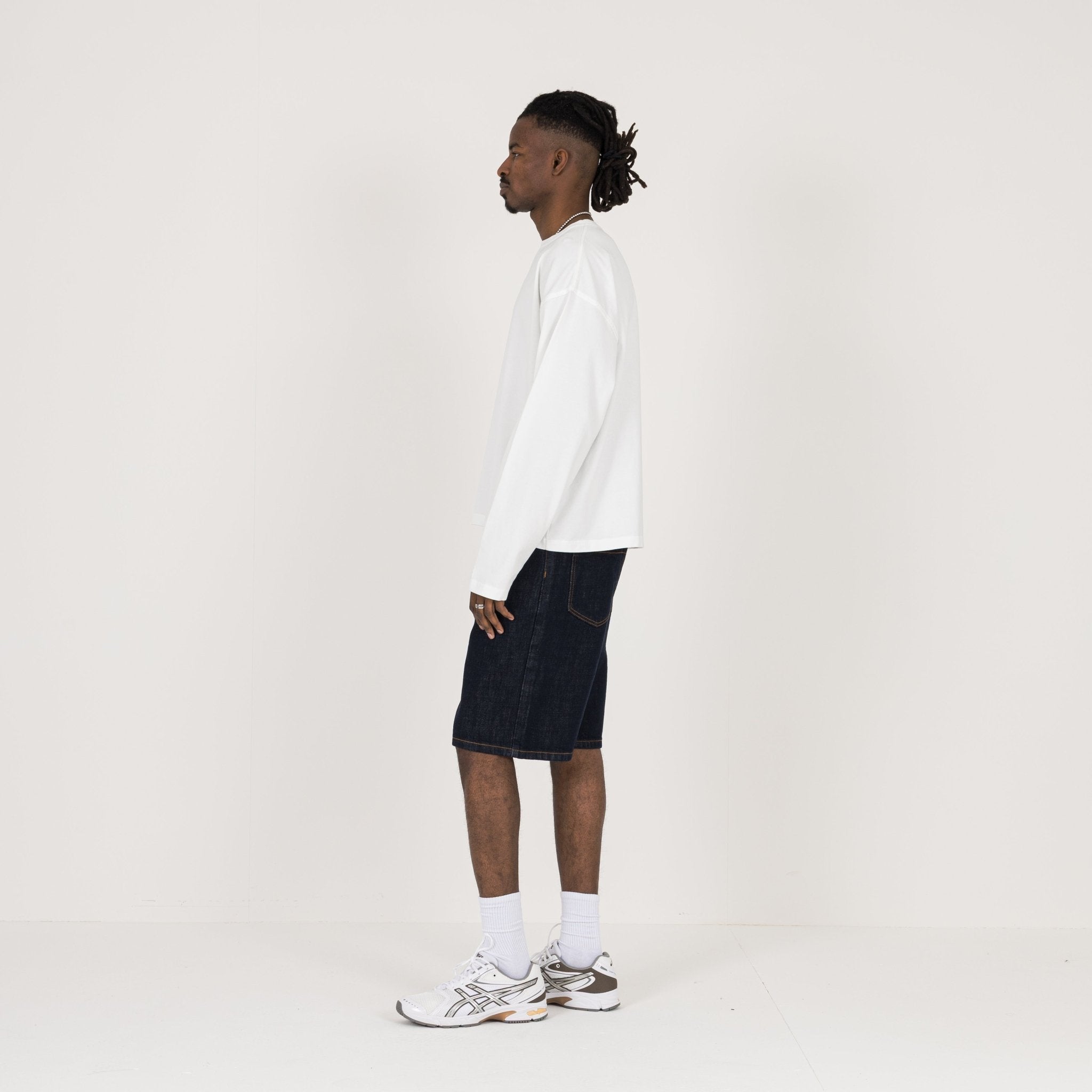 Model Side view of Destructive Cropped L/S Bone White T-Shirt