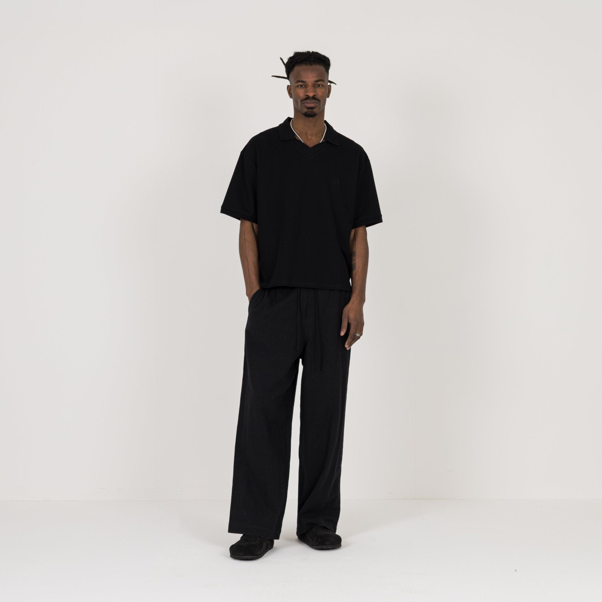 Model view of Destructive Cropped Black Polo Shirt