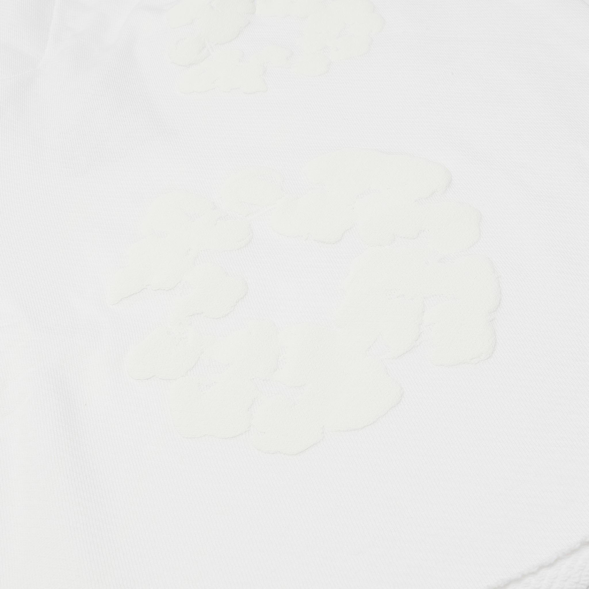 Detail view of Denim Tears Mono The Cotton Wreath White Shorts SS24CR007 WHIT