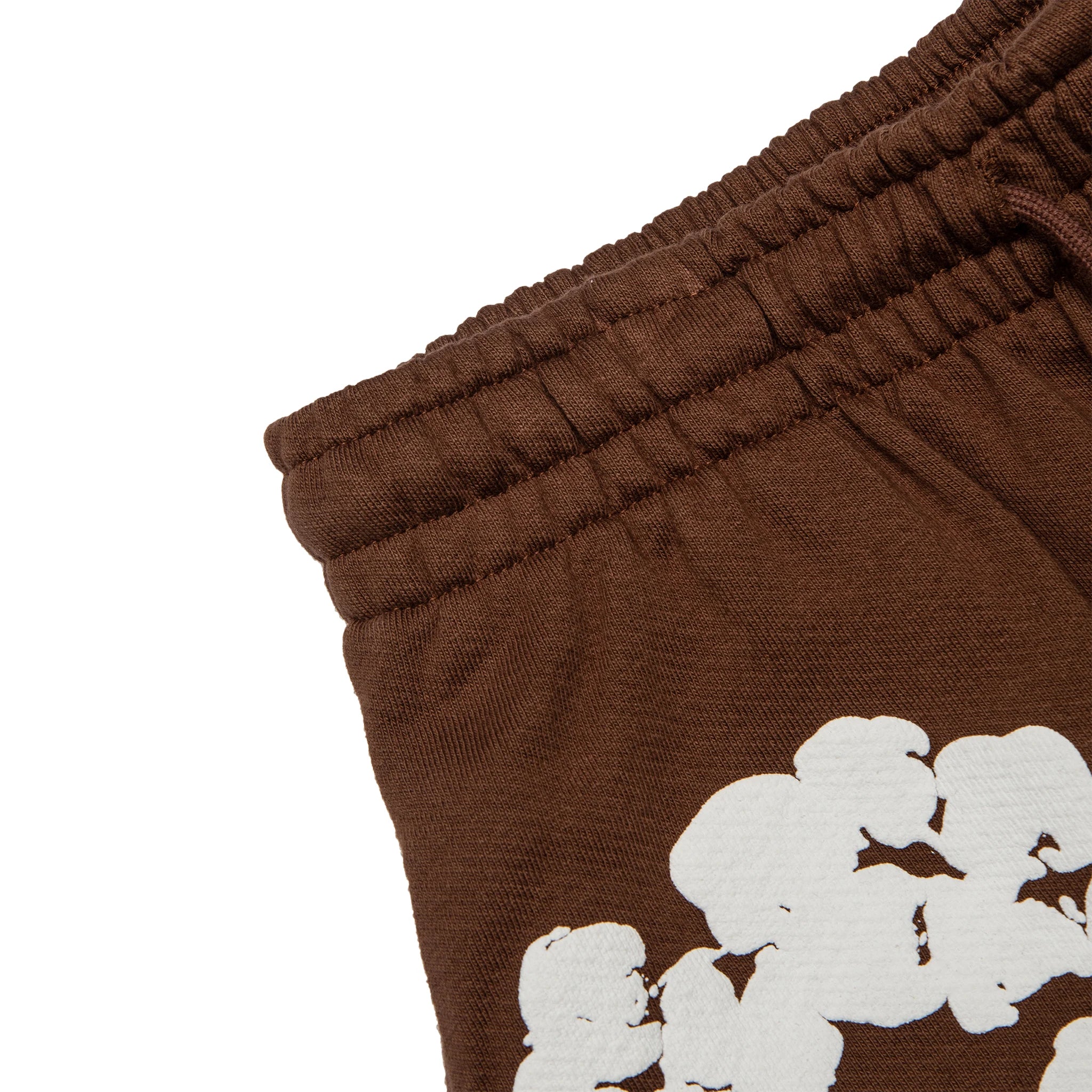 Corner view of Denim Tears The Cotton Wreath Brown Shorts