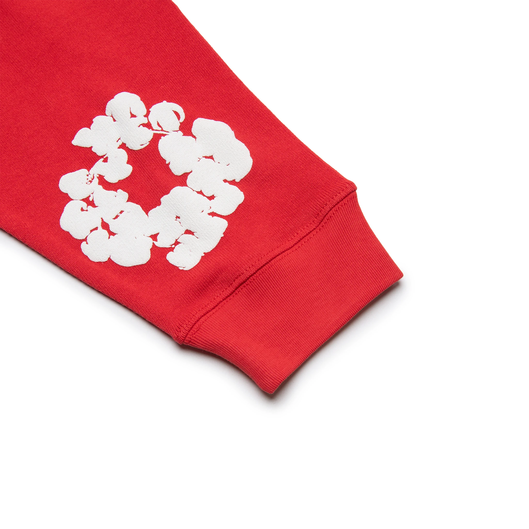 Sleeve view of Denim Tears The Cotton Wreath Long-Sleeve Red T Shirt