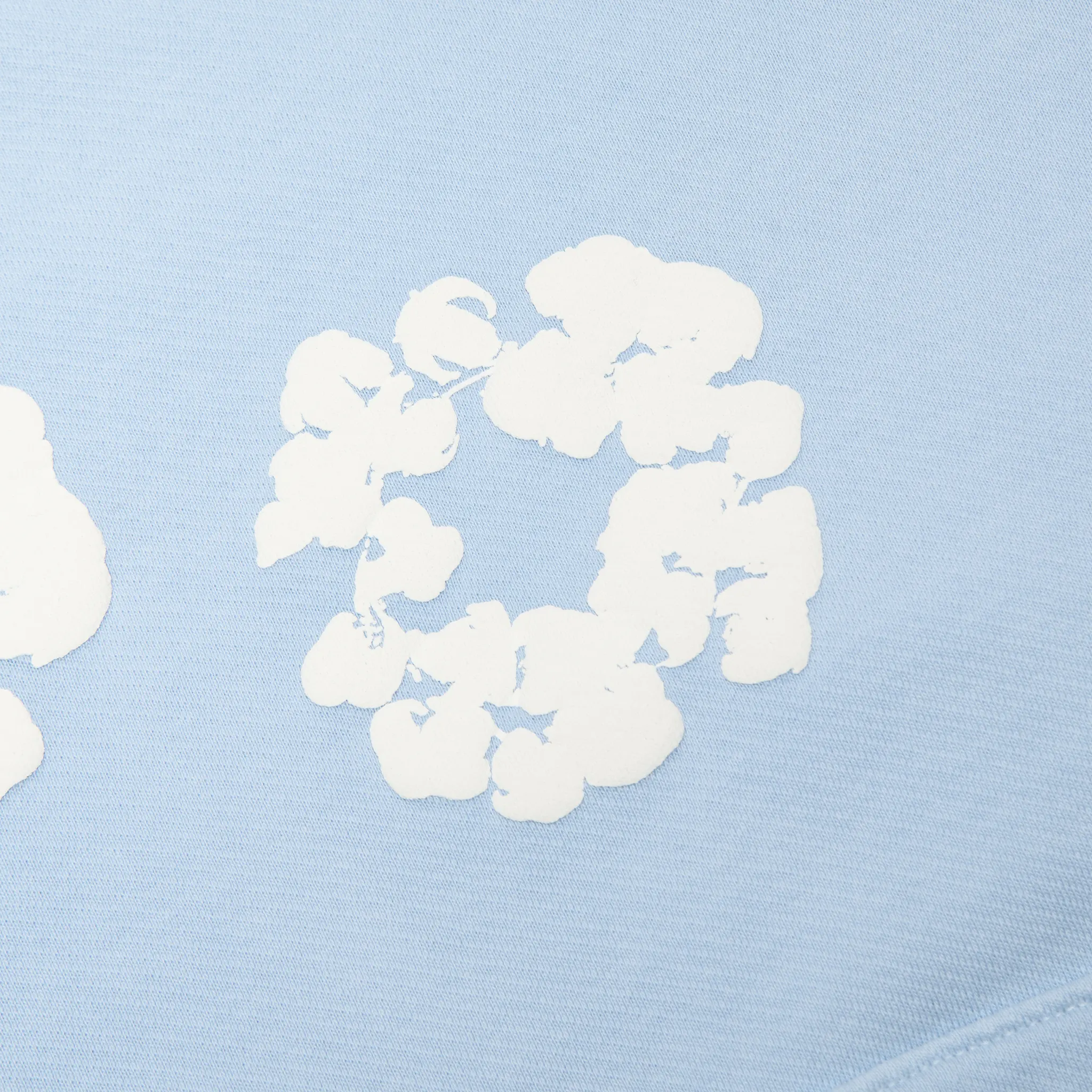 Close up of Denim Tears The Cotton Wreath Powder Blue Hoodie