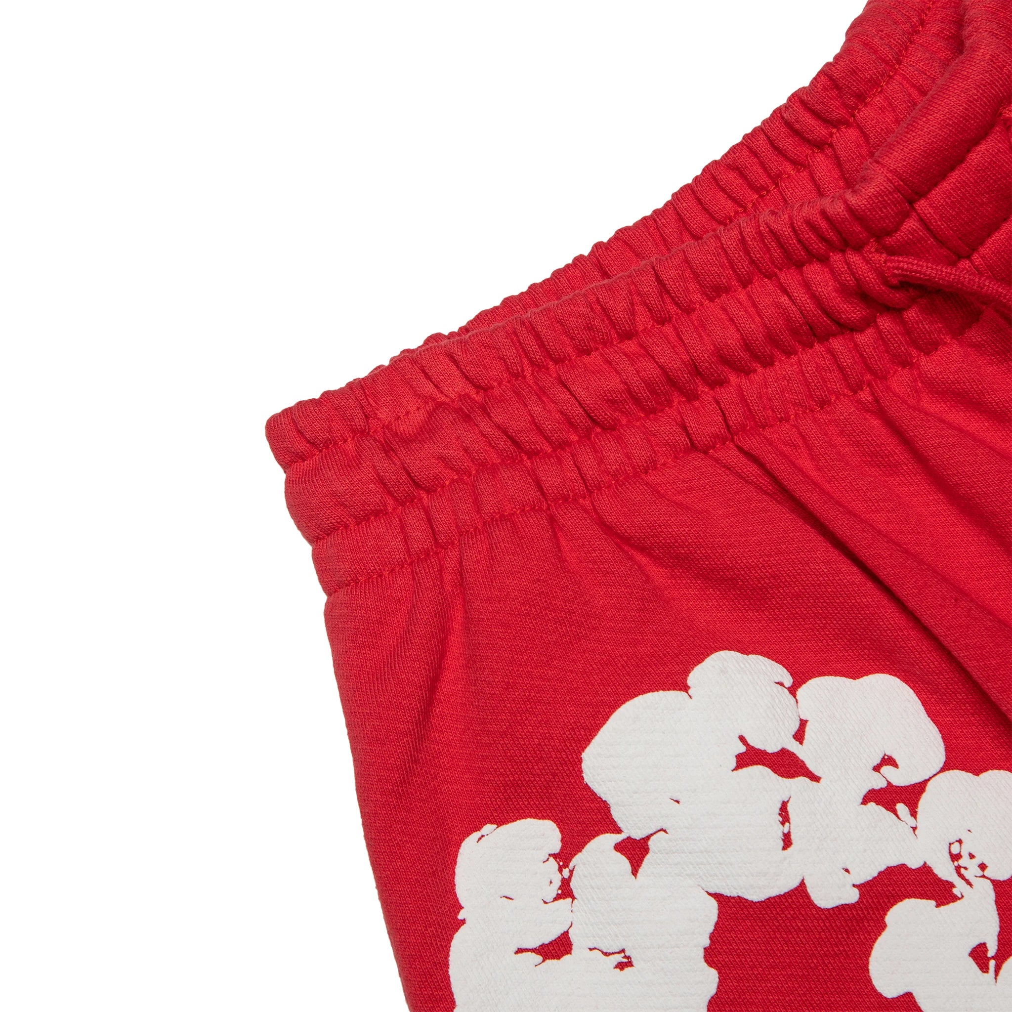 Waist view of Denim Tears The Cotton Wreath Red Shorts