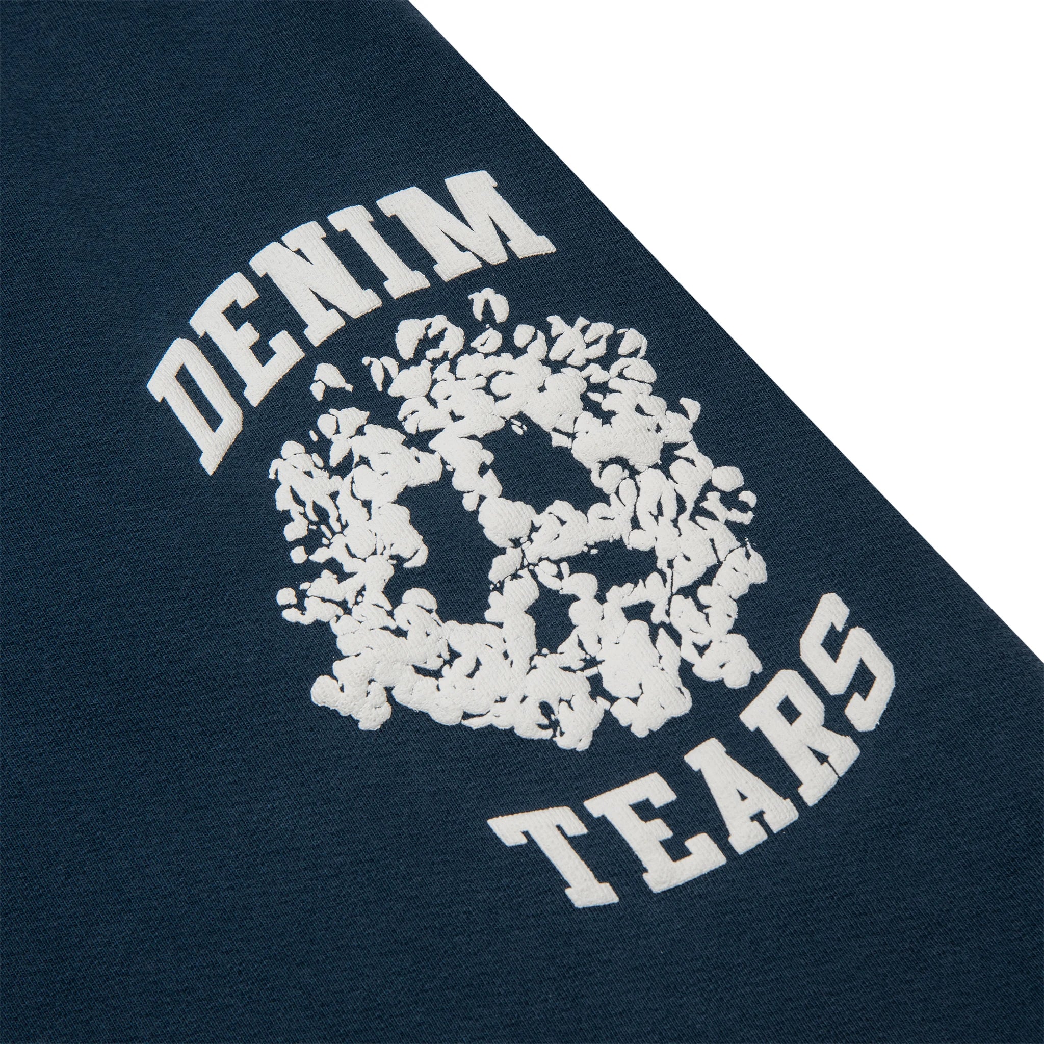 Patch view of Denim Tears University Navy Shorts