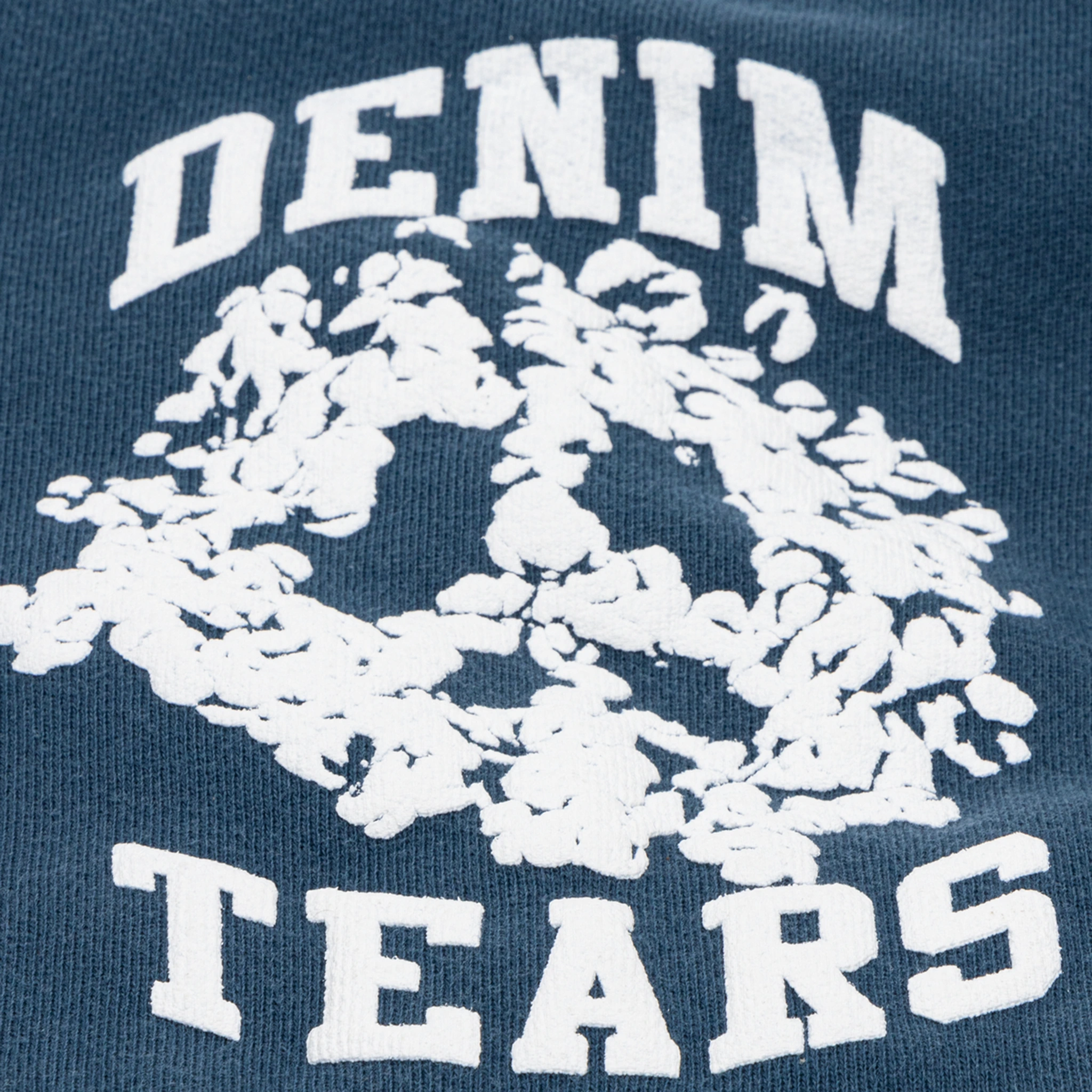 Logo view of Denim Tears University Navy Sweatpants