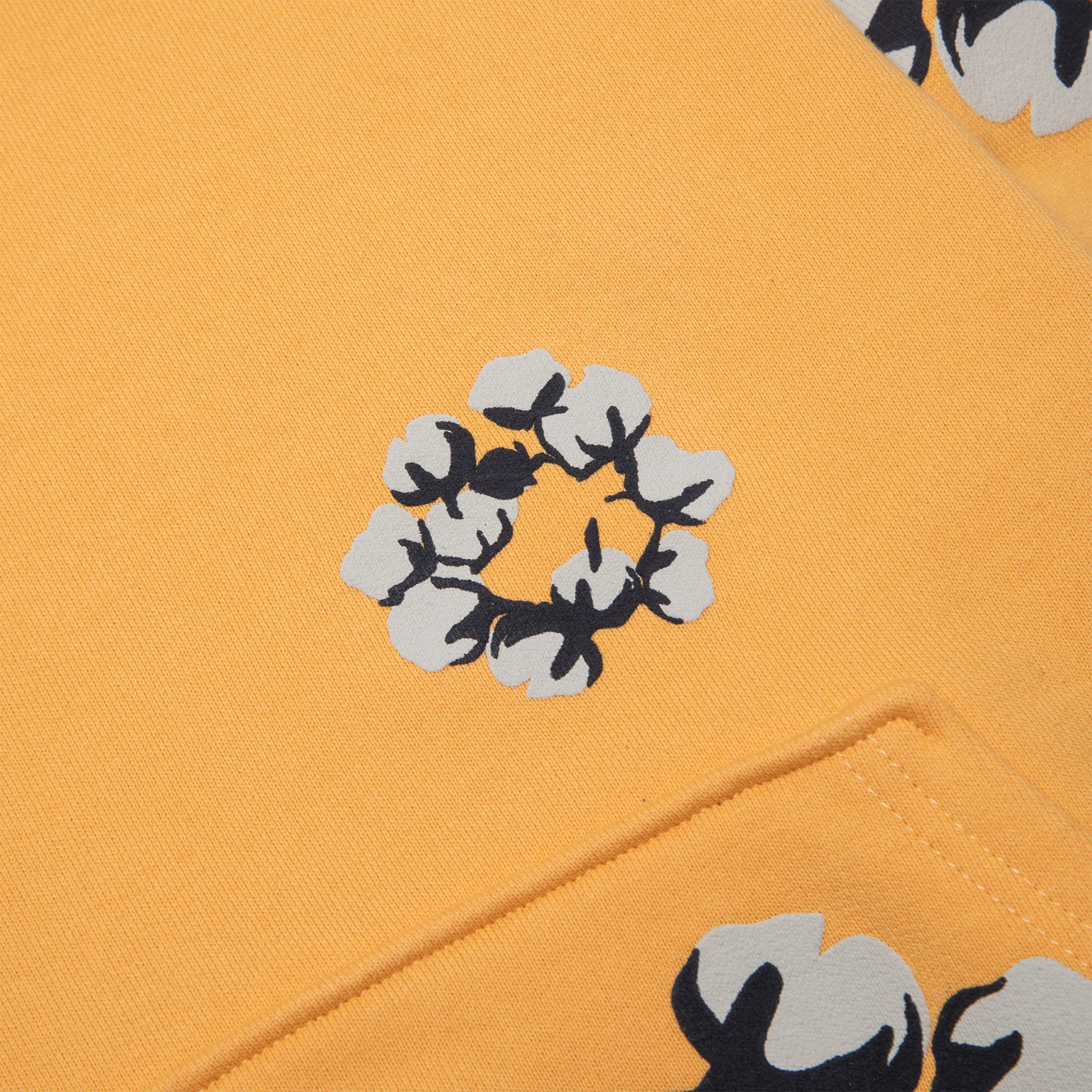 Detail view of Denim Tears x CPFM Cactus Tears Wreath Yellow Hoodie FW24THD024