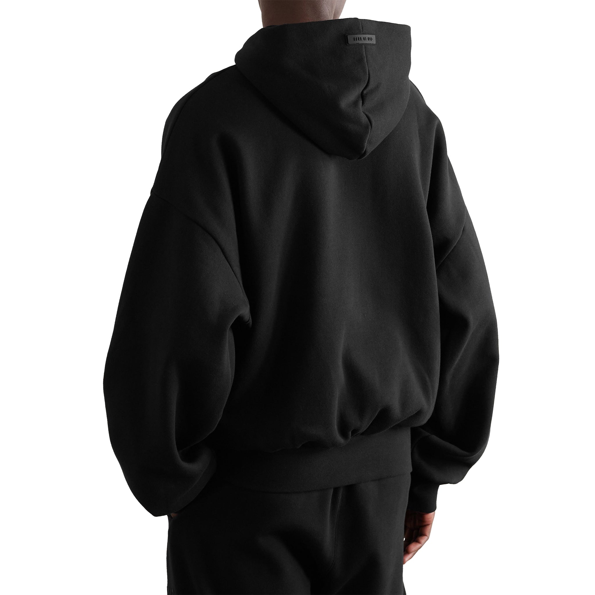 Back view of Fear Of God Essentials Black Hoodie (SS23)