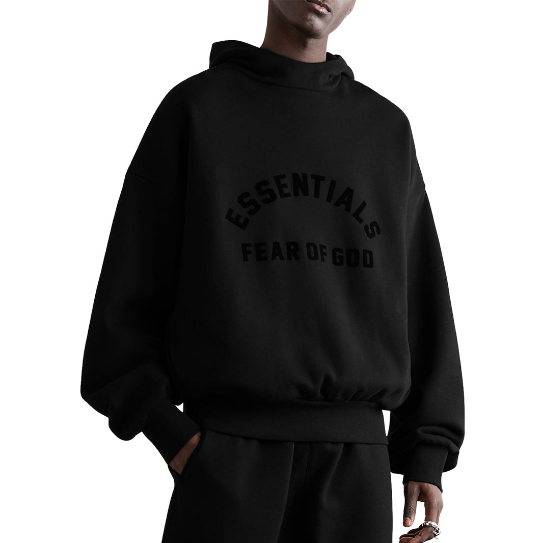 Model front view of Fear Of God Essentials Black Hoodie (SS23)