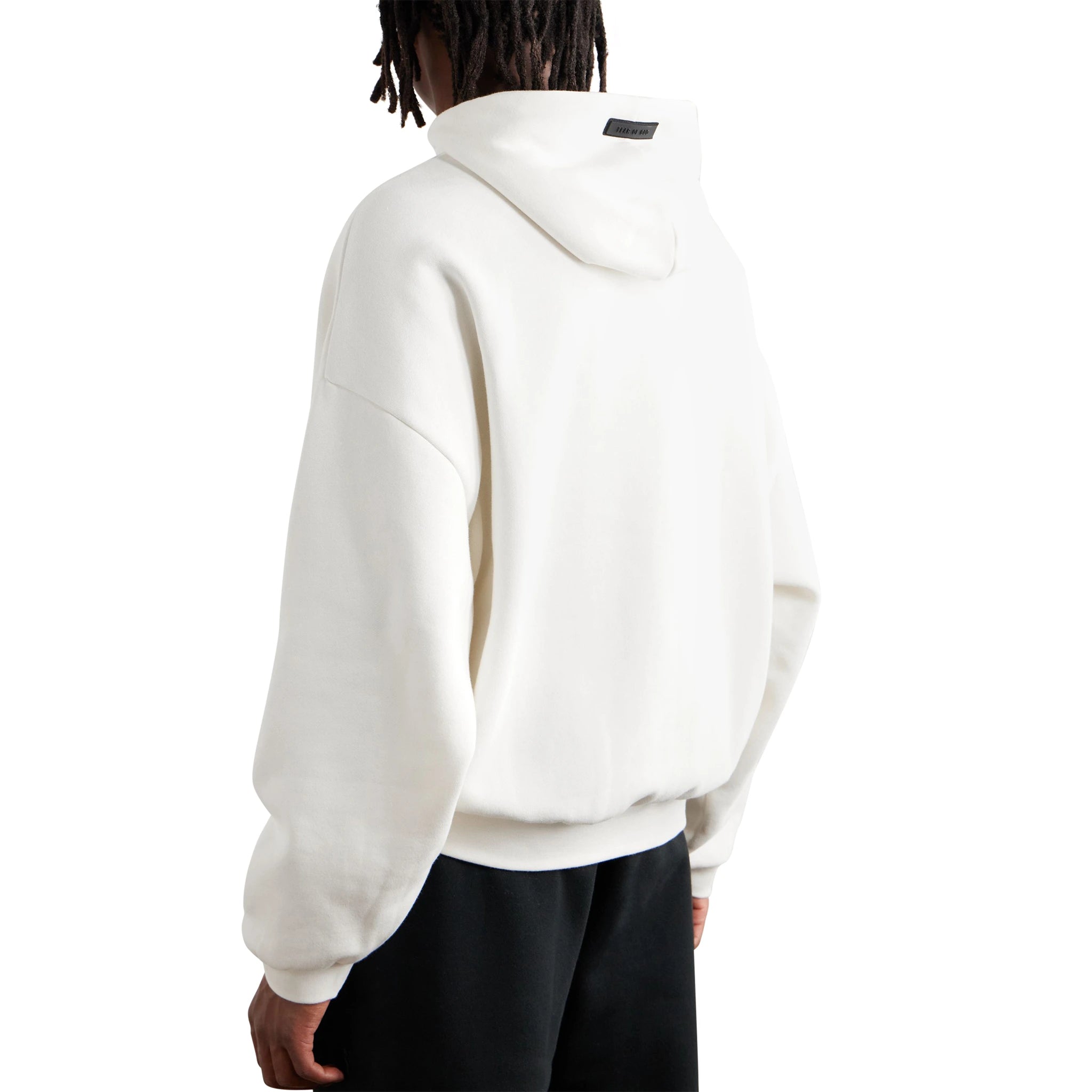 Model back view of Fear Of God Essentials Cloud Dancer Hoodie