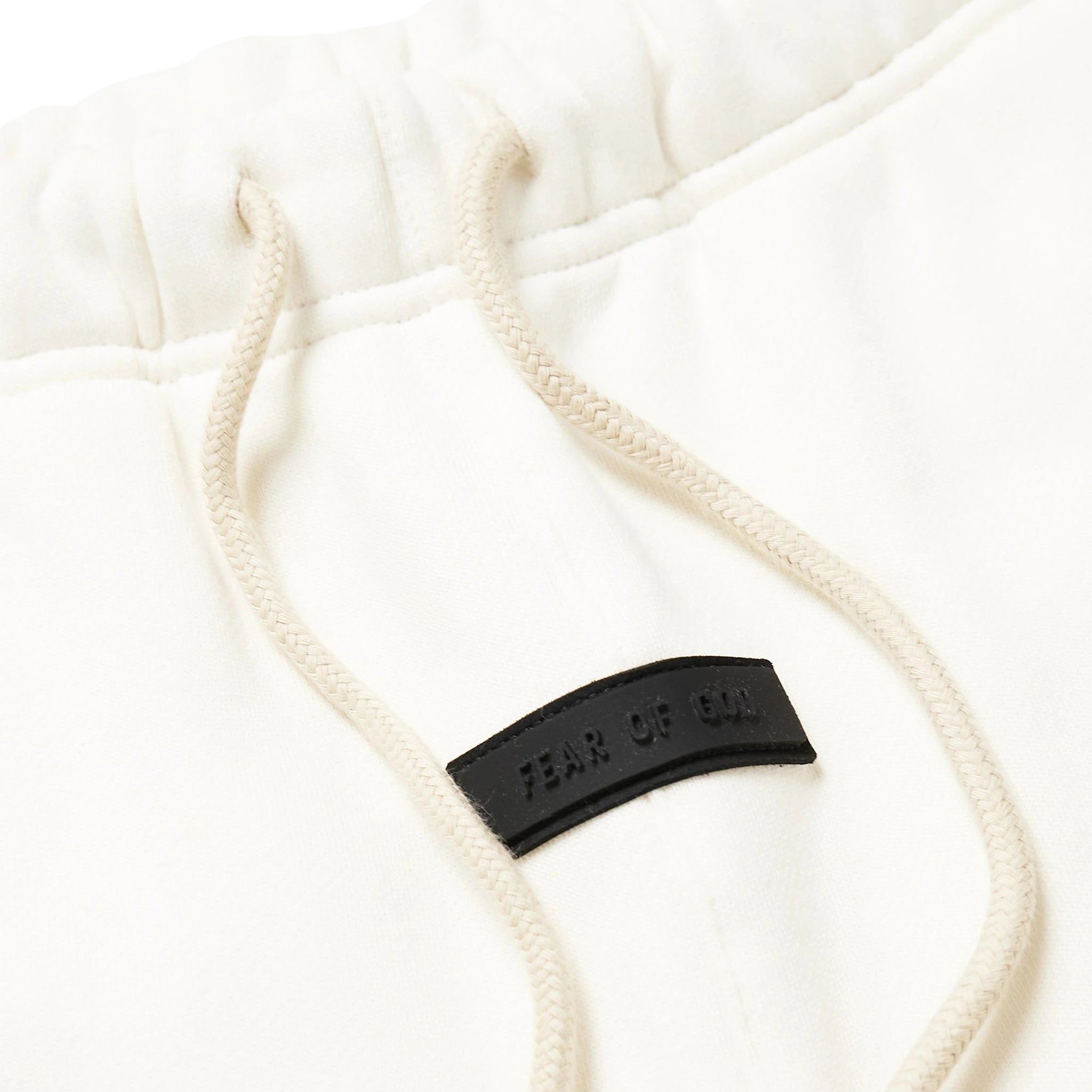 Logo view of Fear Of God Essentials Cloud Dancer Sweatpants