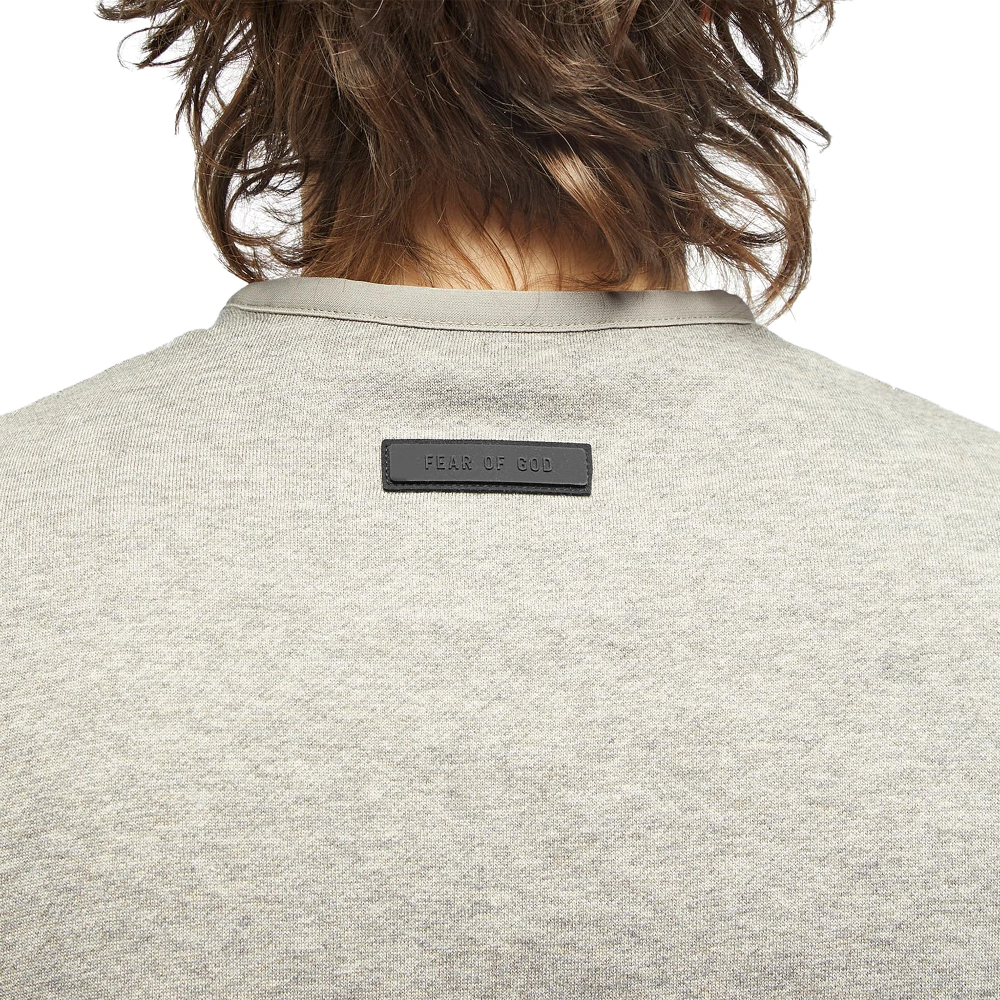 Model neck view of Fear Of God Essentials Dark Heather Oatmeal Crewneck (FW23) 192SP244683F