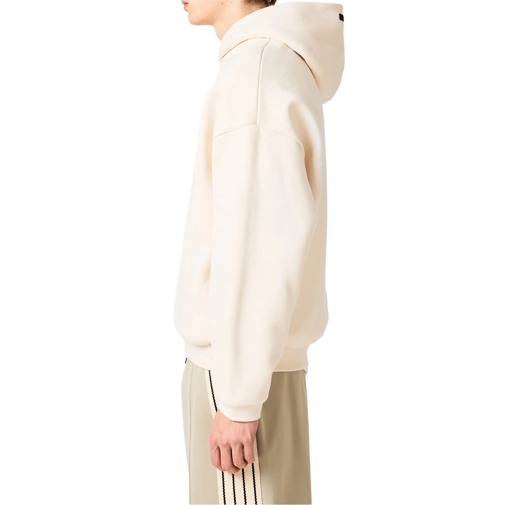 Model Side View of Fear Of God Essentials Fleece Shell White Hoodie (FW24) 192BT246252F