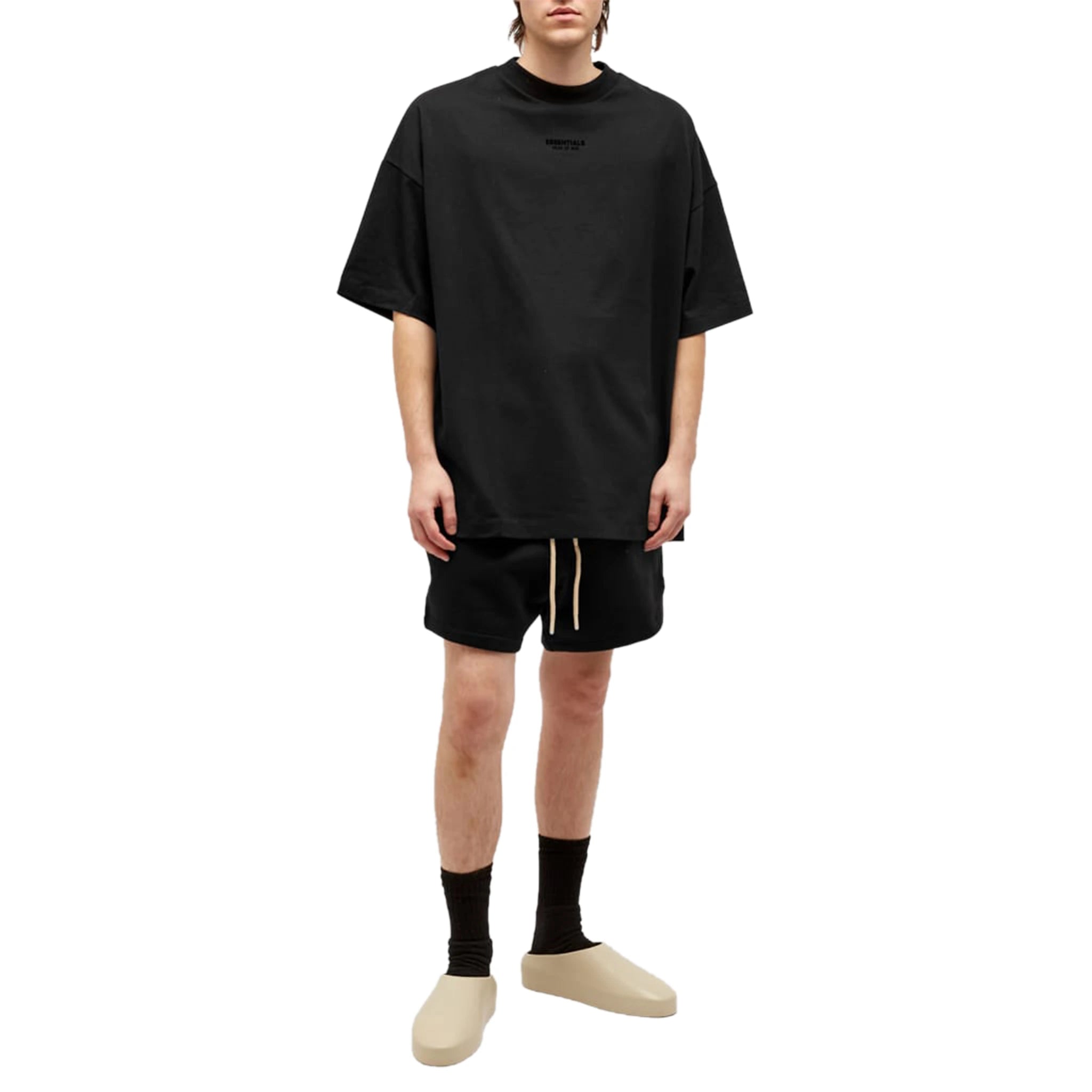 Model back view of Fear Of God Essentials Jet Black Shorts (FW23) 160BT232000F