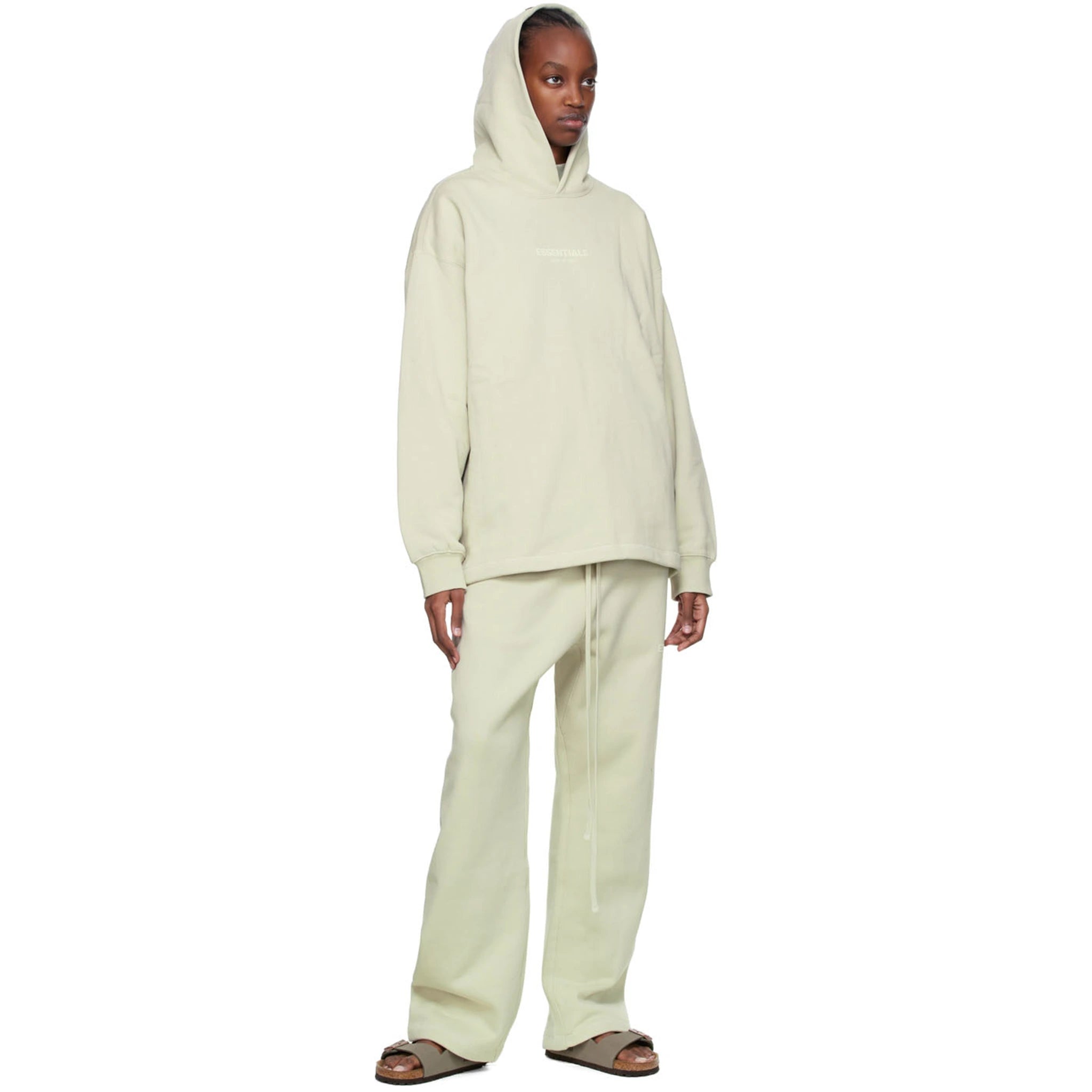 Model view of Fear Of God Essentials Relaxed Wheat Sweatpants (SS22) 130BT212047F