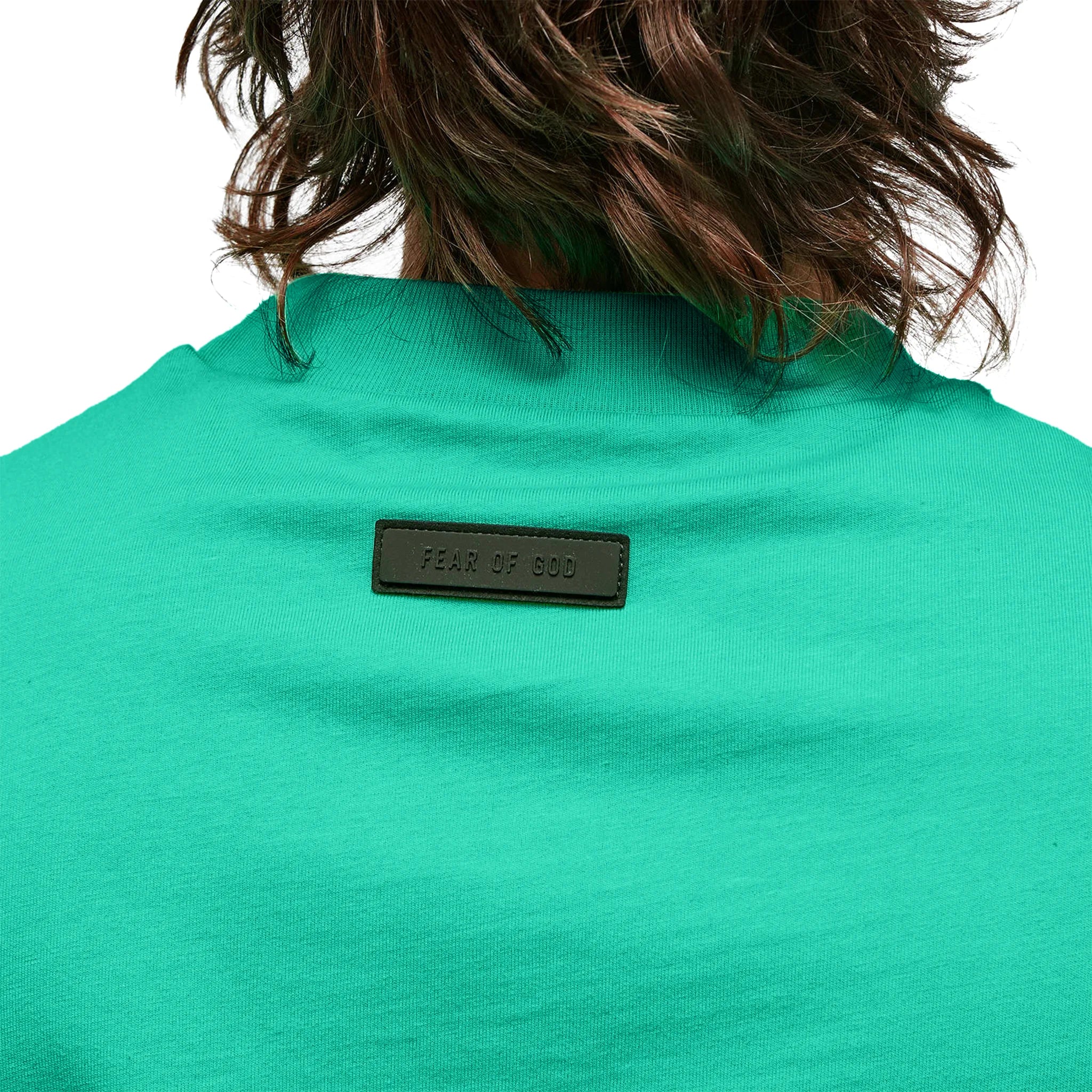 Model neck view of Fear of God Essentials SS Mint Leaf T Shirt (FW23) 125SP244192F