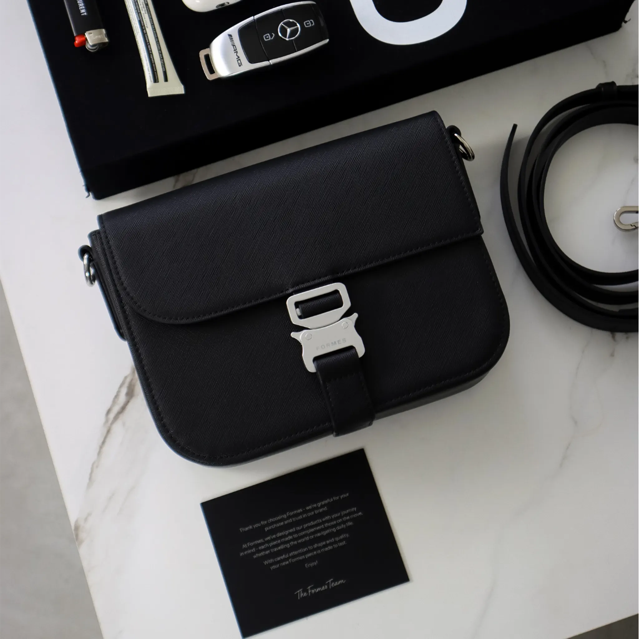 Front Upper View of Formes Tecnica Nero Crossbody Bag