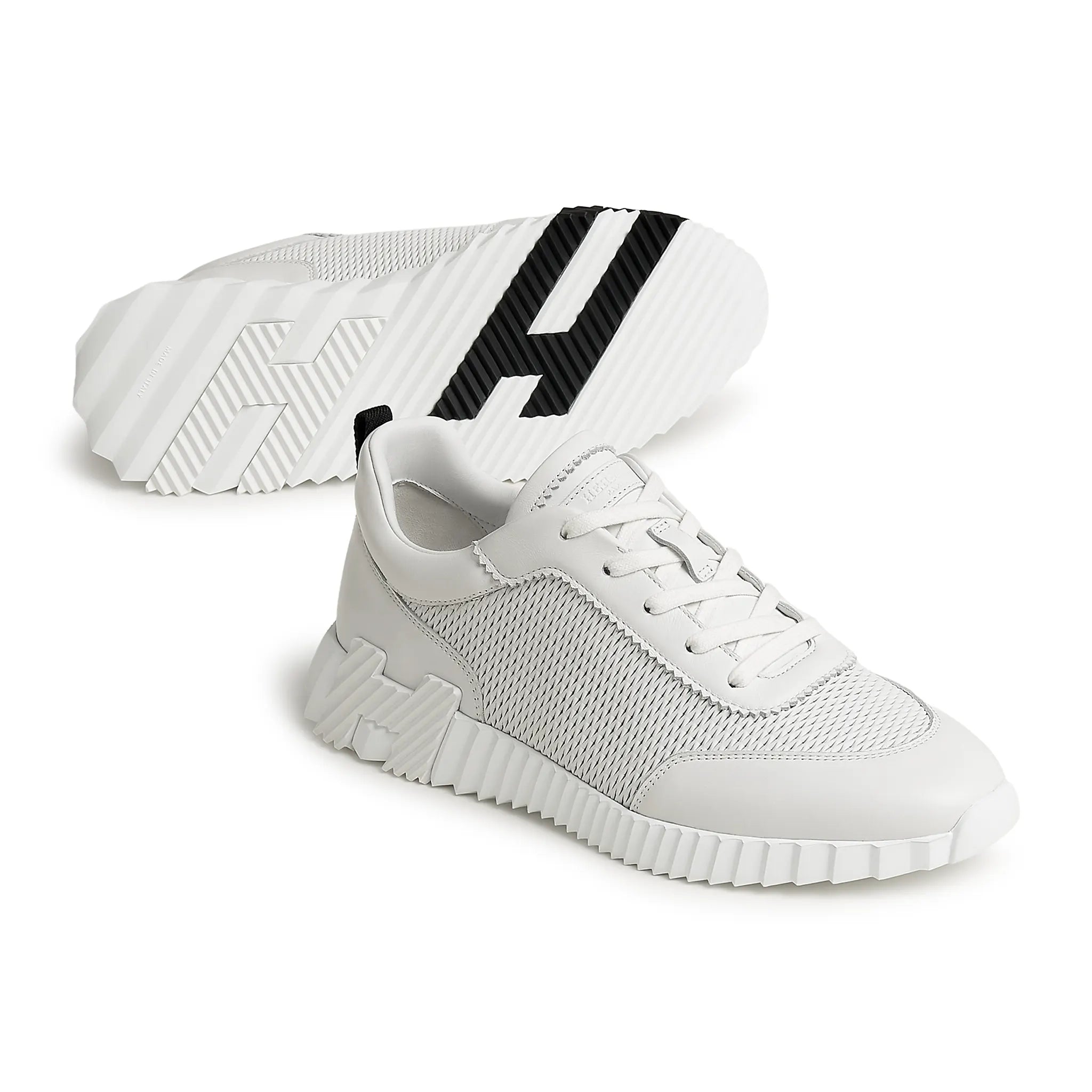 Side Sole View of Hermes Paris Bouncing Perforated Leather Sneaker Blanc H261895ZH01400