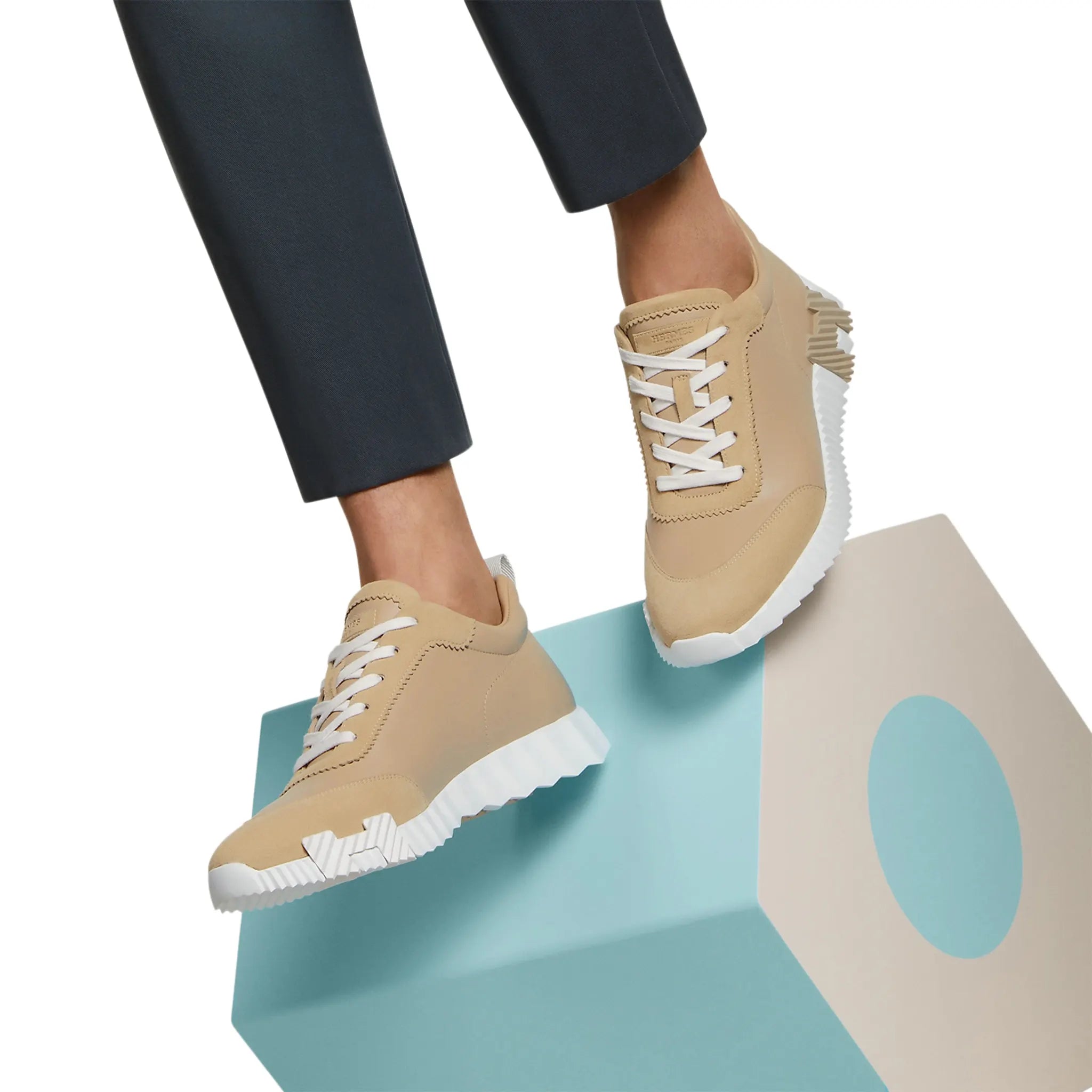 Model view of Hermes Paris Bouncing Sneaker Beige Lin H221898ZH5K390