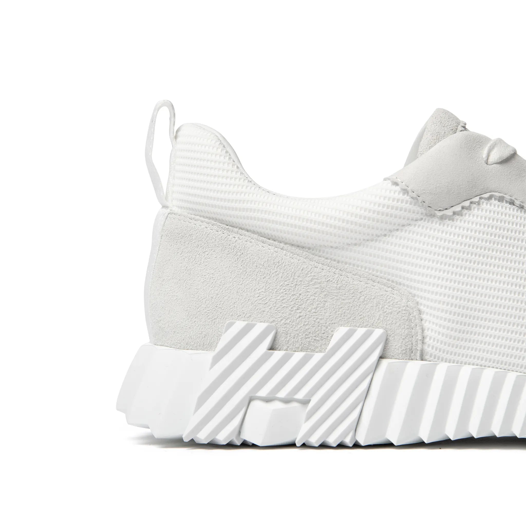 Close up image of Hermès Paris Bouncing Sneaker Triple White
