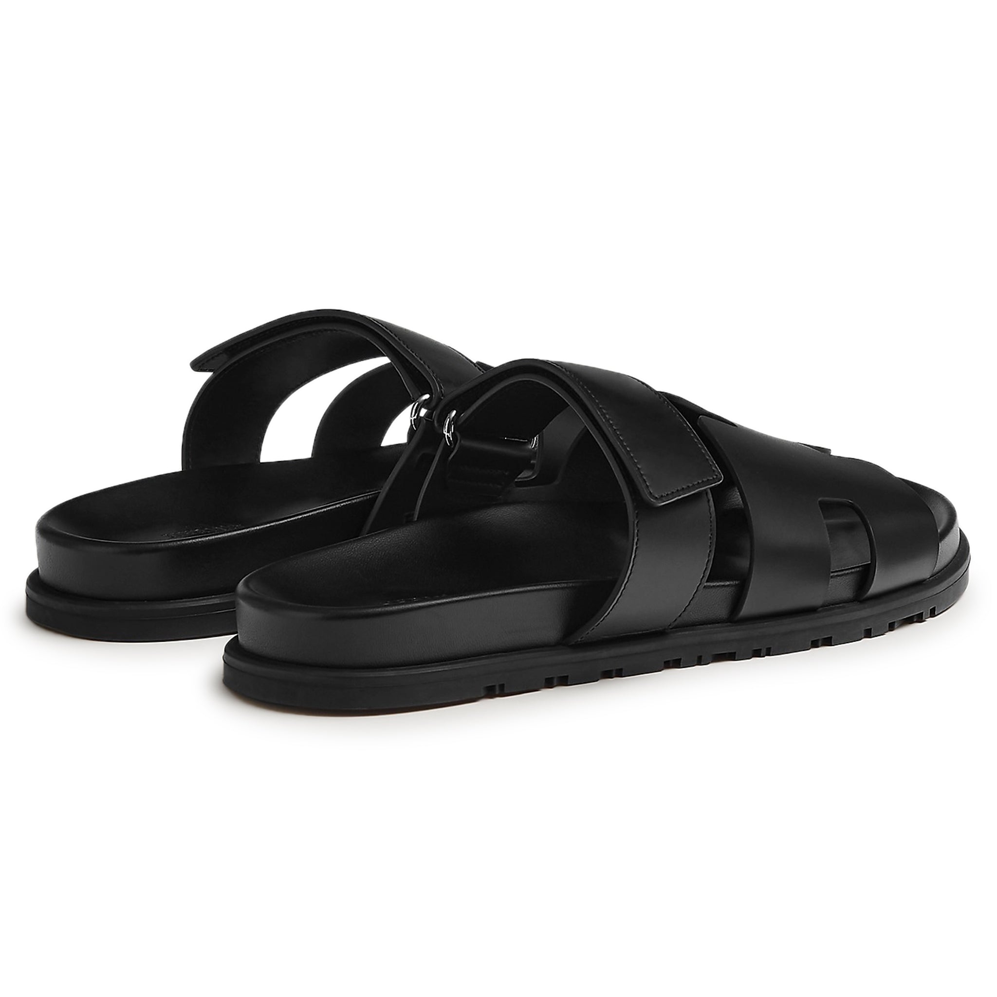 Back side view of Hermes Paris Chypre Leather Sandal Black H211865ZH01390