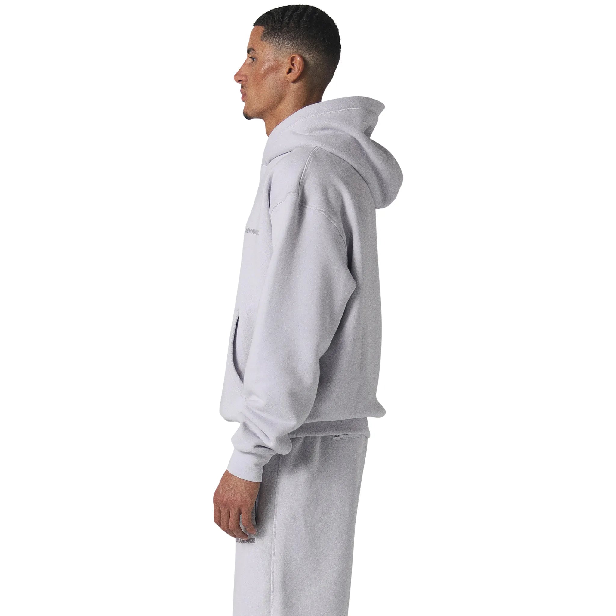 Model male side Human Race Erisi Orchid Purple Hoodie