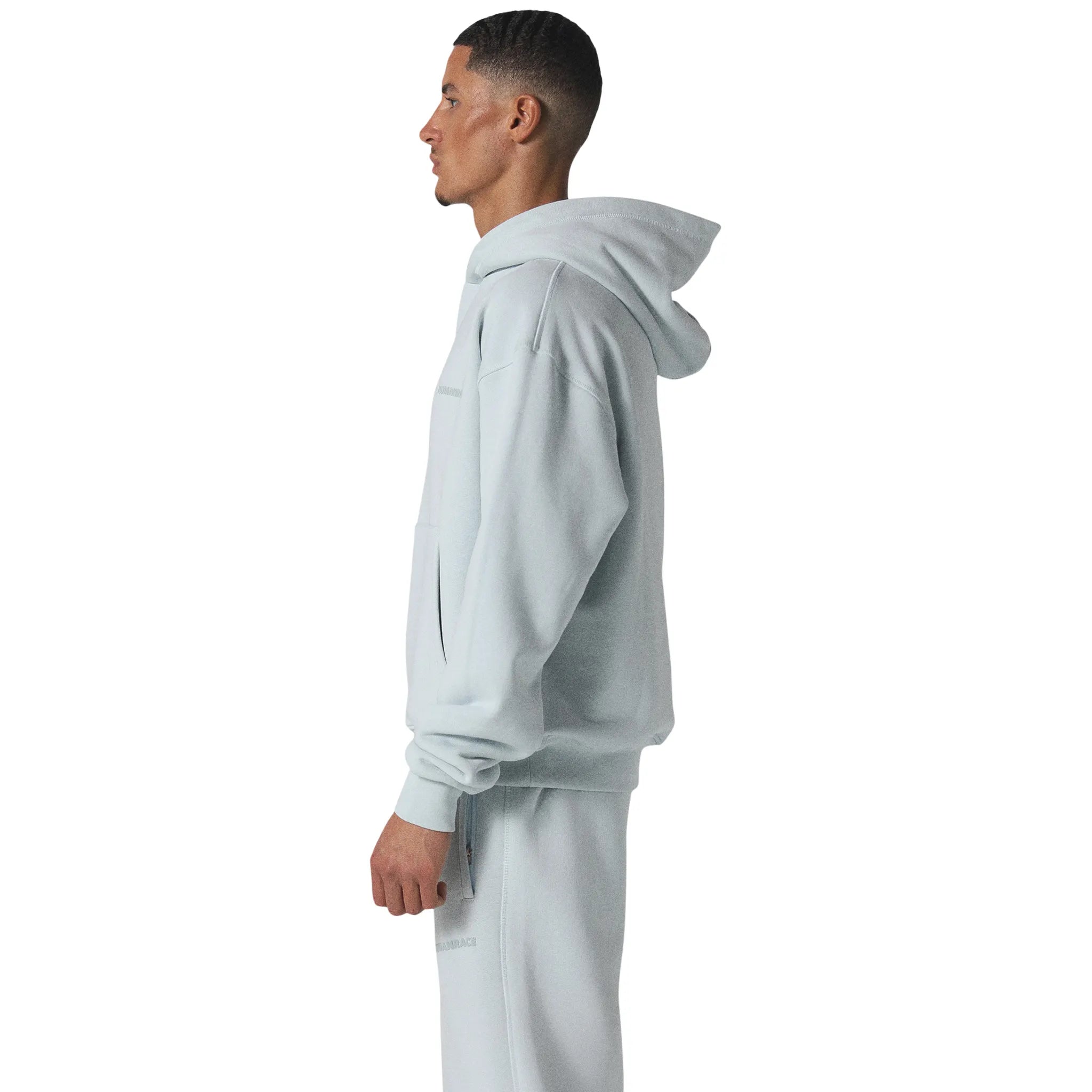 Model side view of Human Race Erisi Soft Blue Hoodie