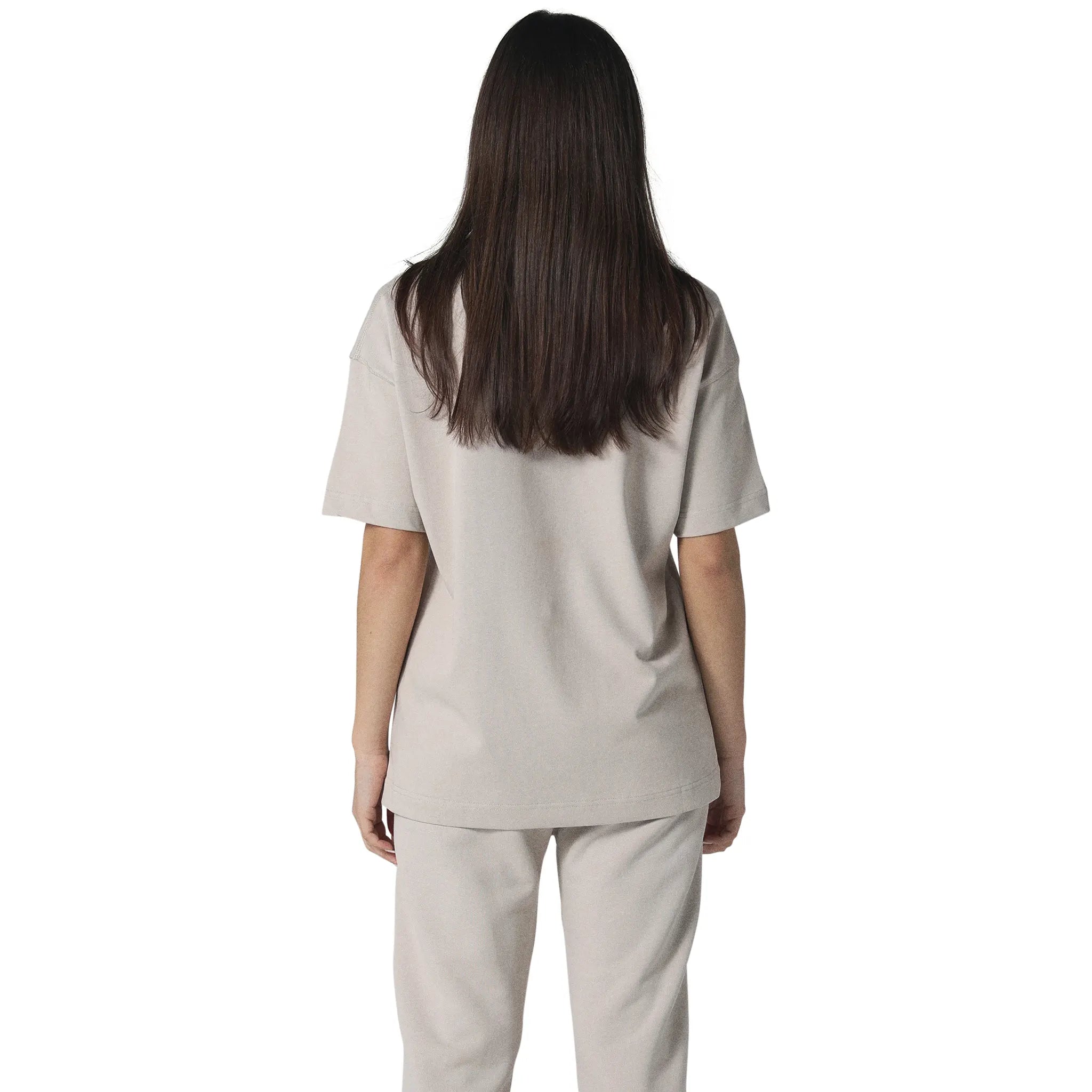 Model female back view of Human Race Space Deep Taupe T Shirt
