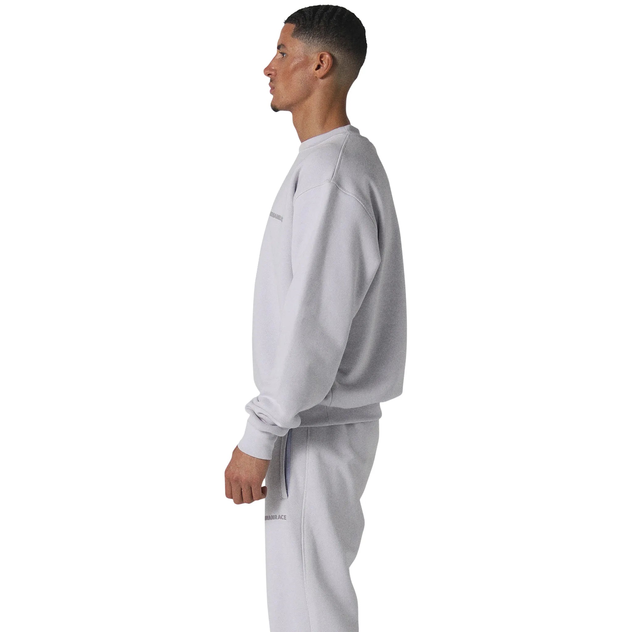 Model side view of Human Race World Orchid Purple Sweatshirt