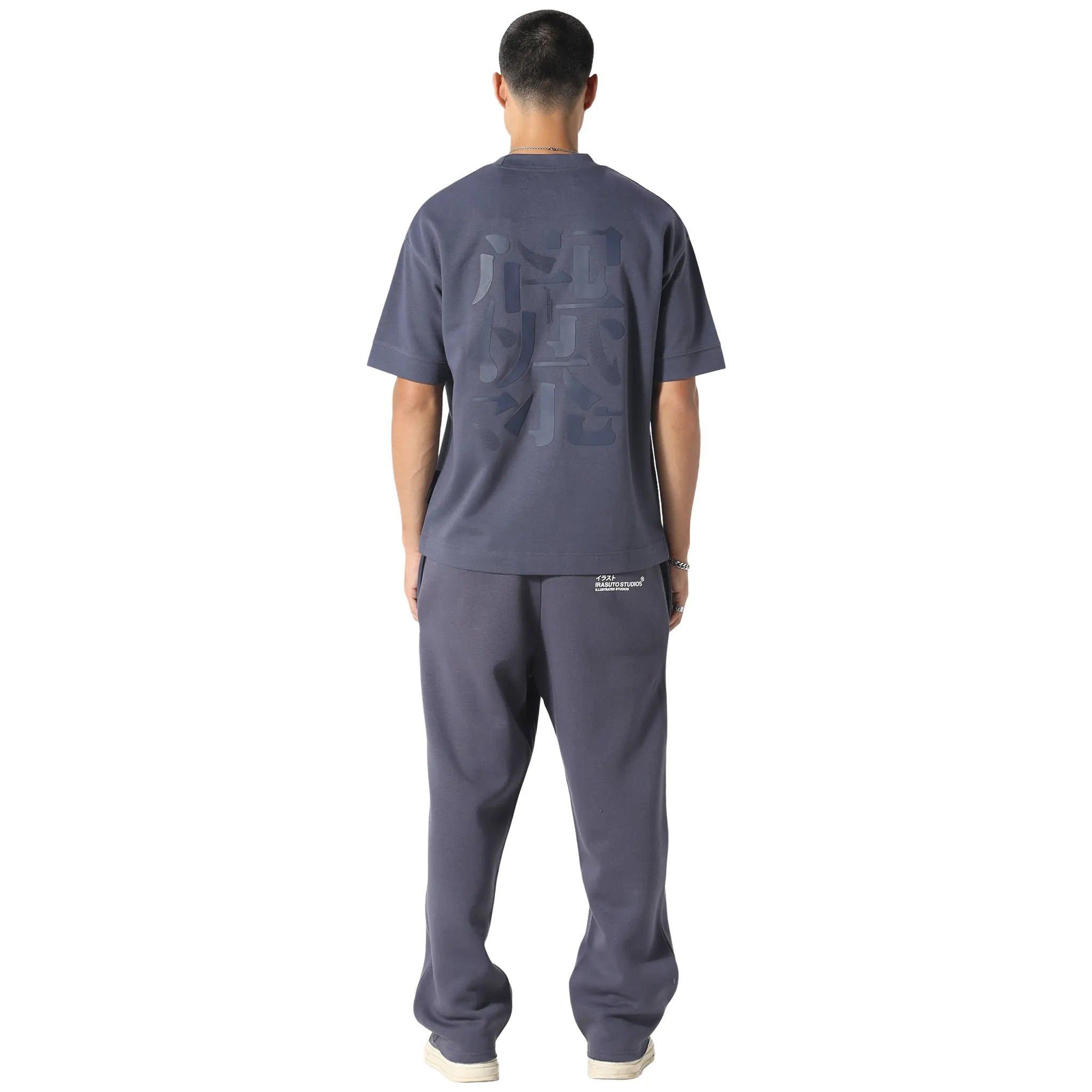 Model Back View of Irasuto Studios Raw Hem Deep Sea Sweatpants 5060615210022