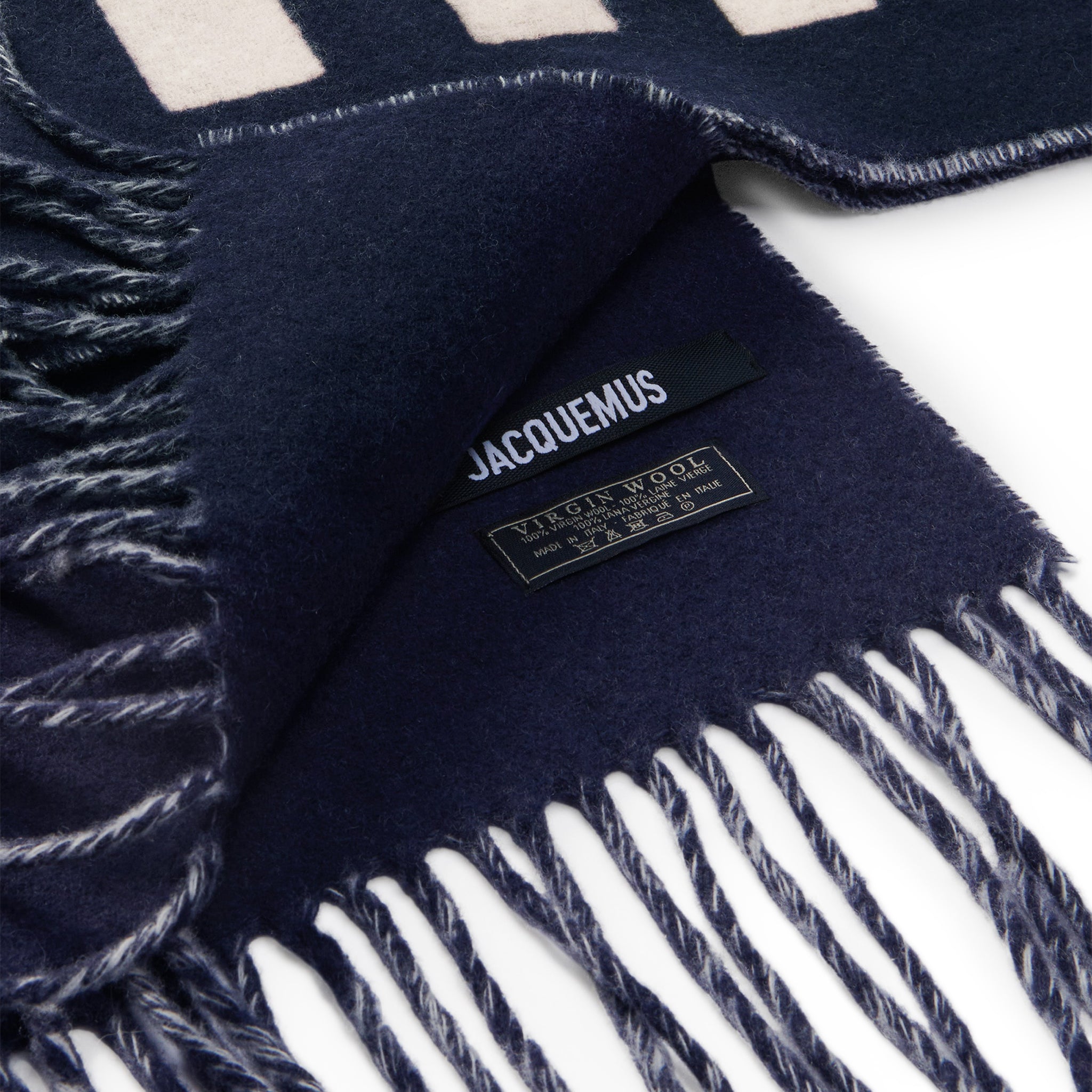 Close up of Jacquemus L'echarpe Fringe Logo Navy Scarf