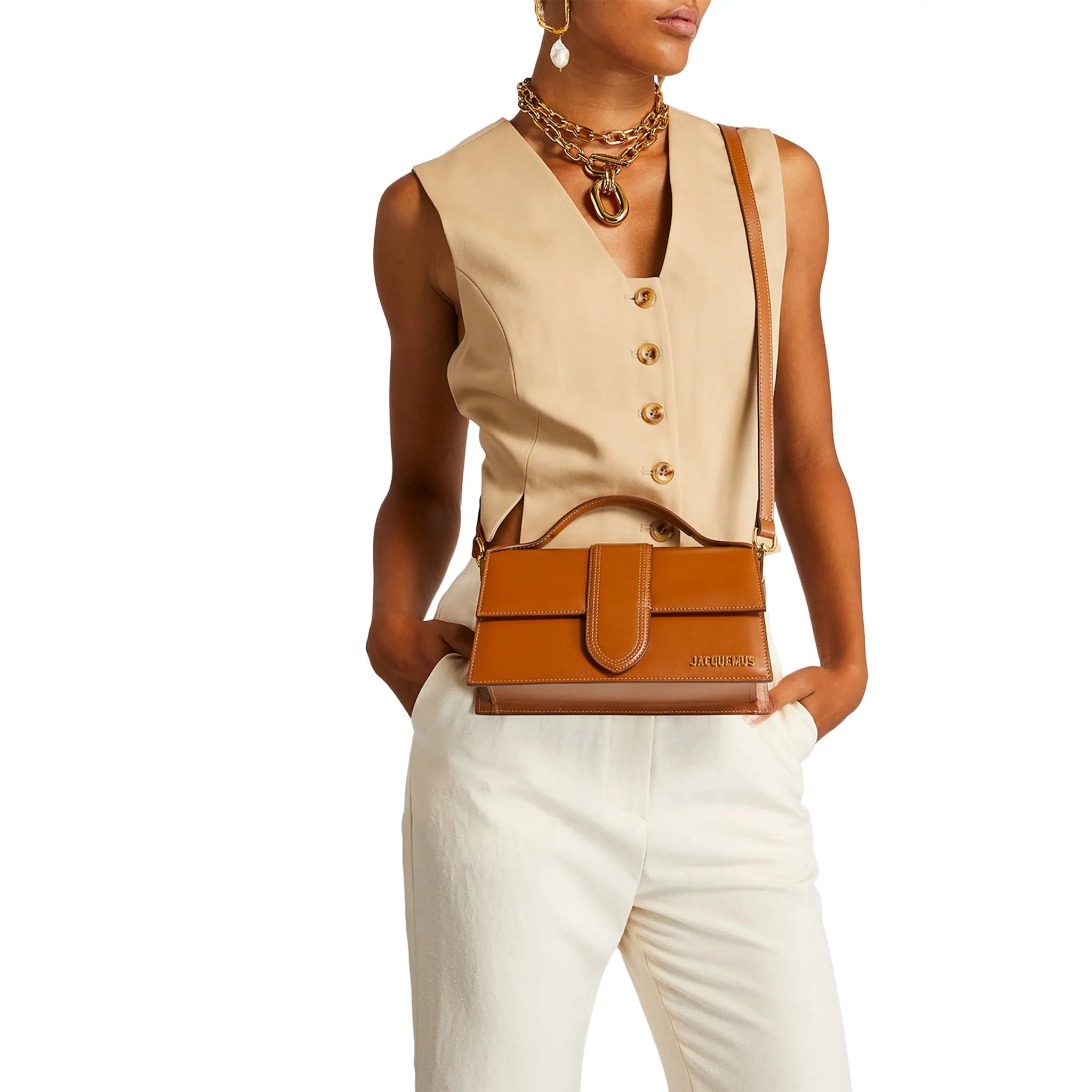 Model View of Jacquemus Large Bambino Light Brown Crossbody Bag BAW00007AC01C04811