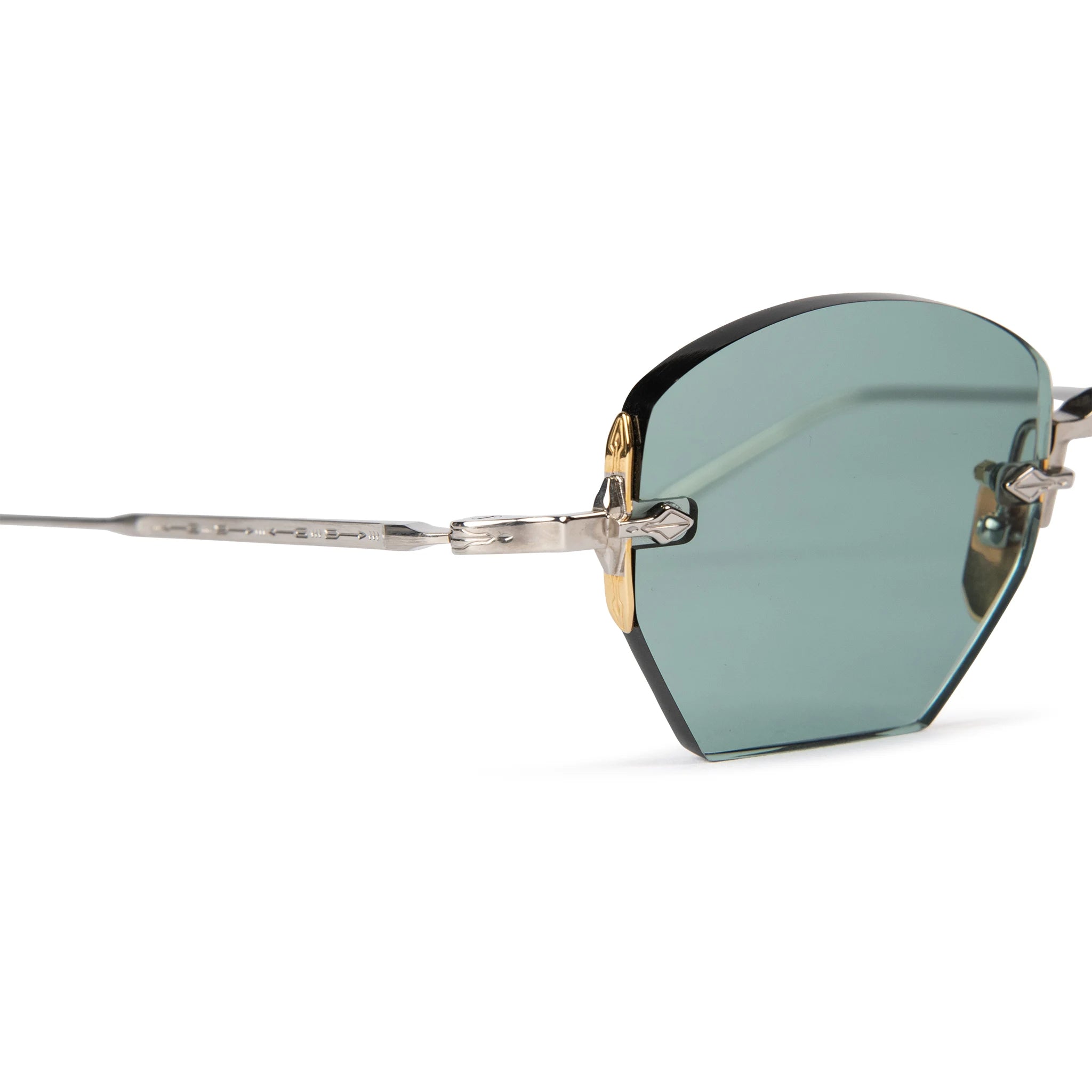 Corner view of Jacques Marie Mage Oatman Silver Gold Green Sunglasses