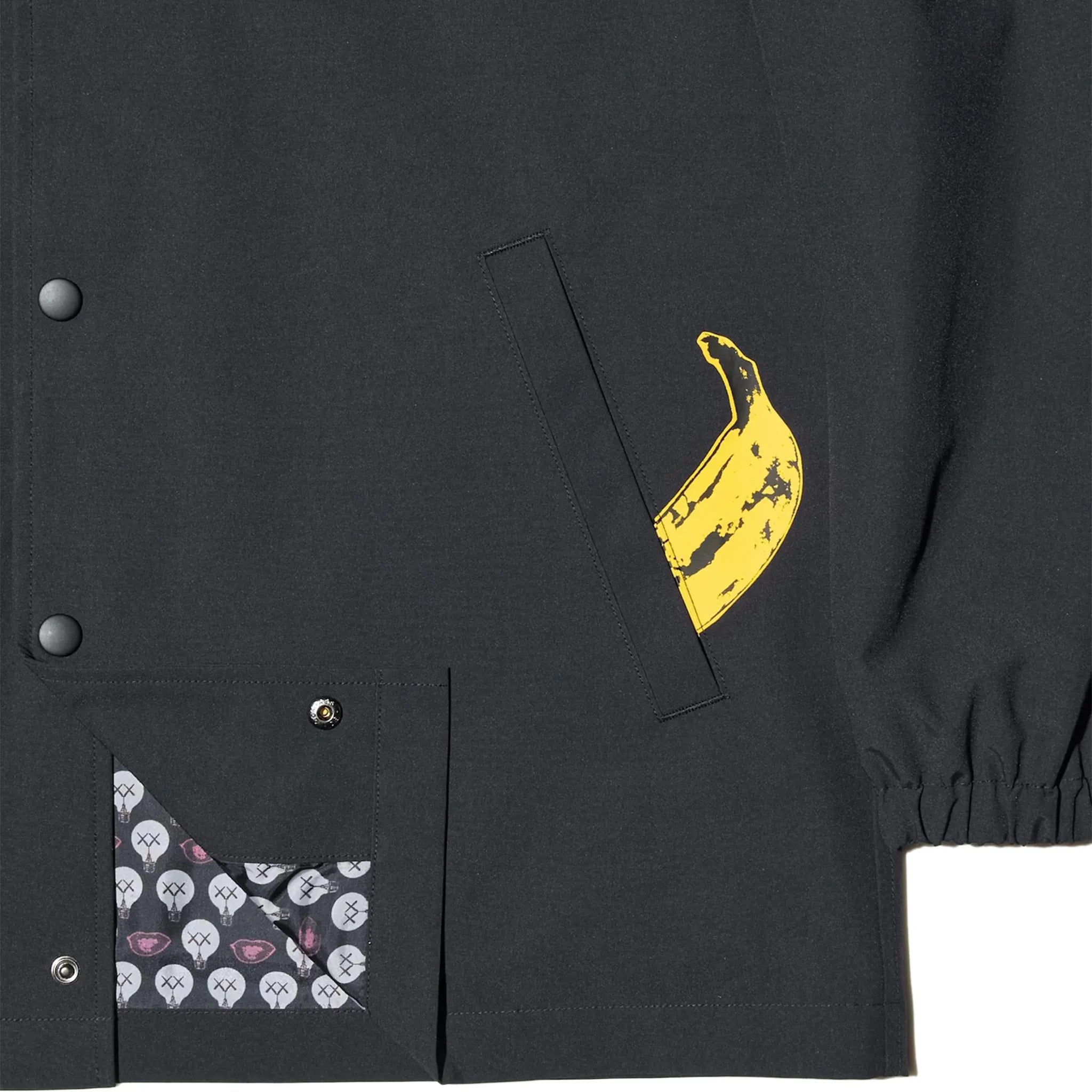 Inside and pocket view of Kaws x Uniqlo Warhol Coach Black Jacket 474138