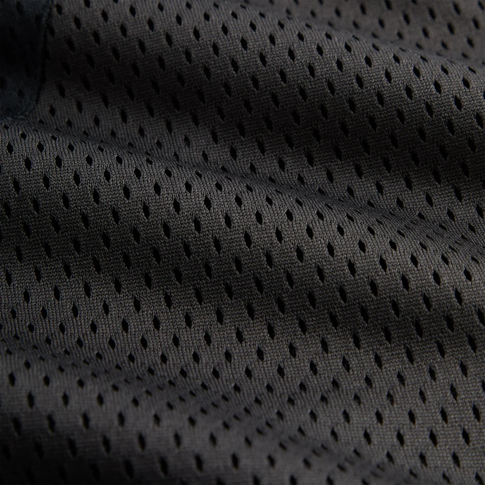 Close up of Kith Mesh Turbo Shorts Black