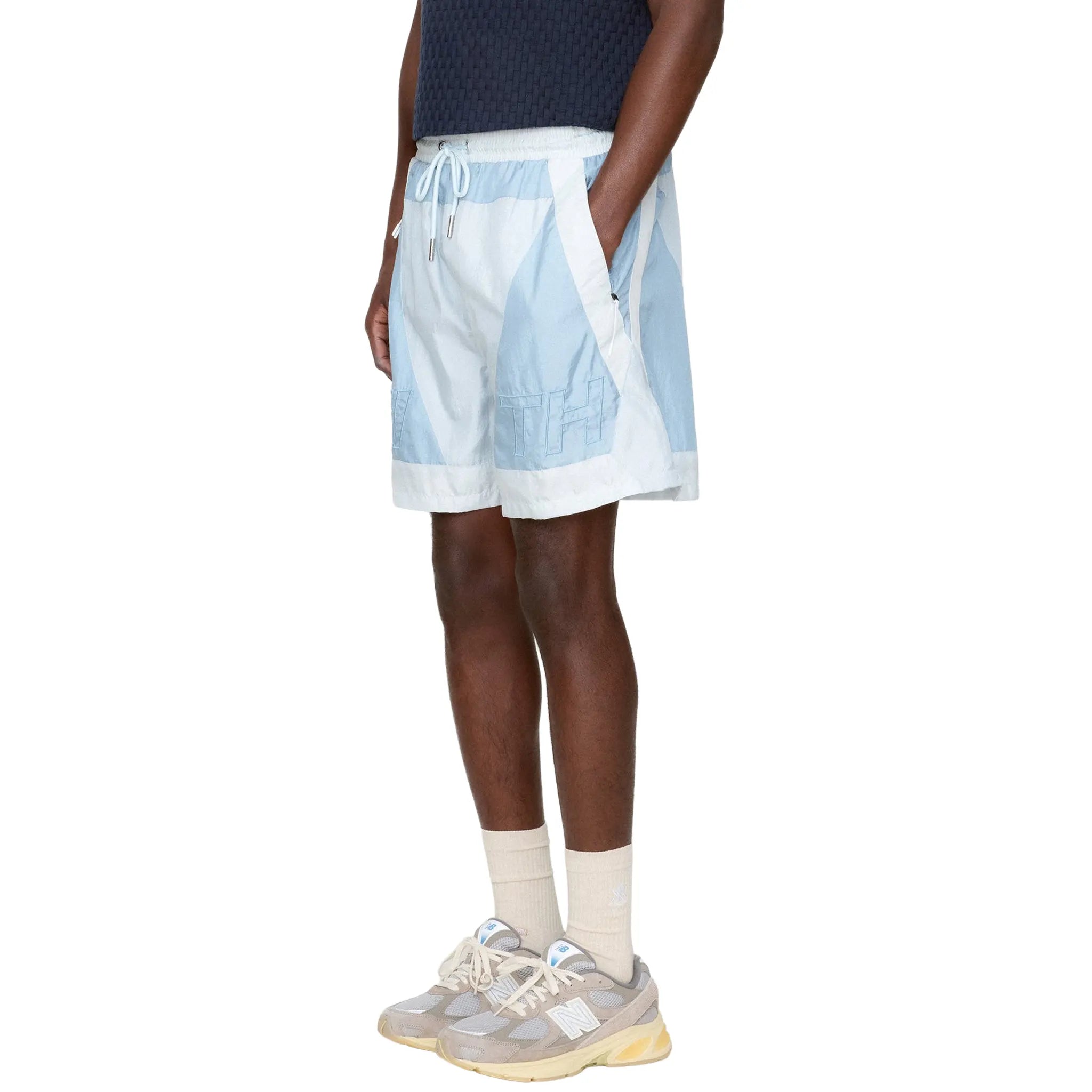 Model View of Kith Washed Turbo Analysis Shorts
