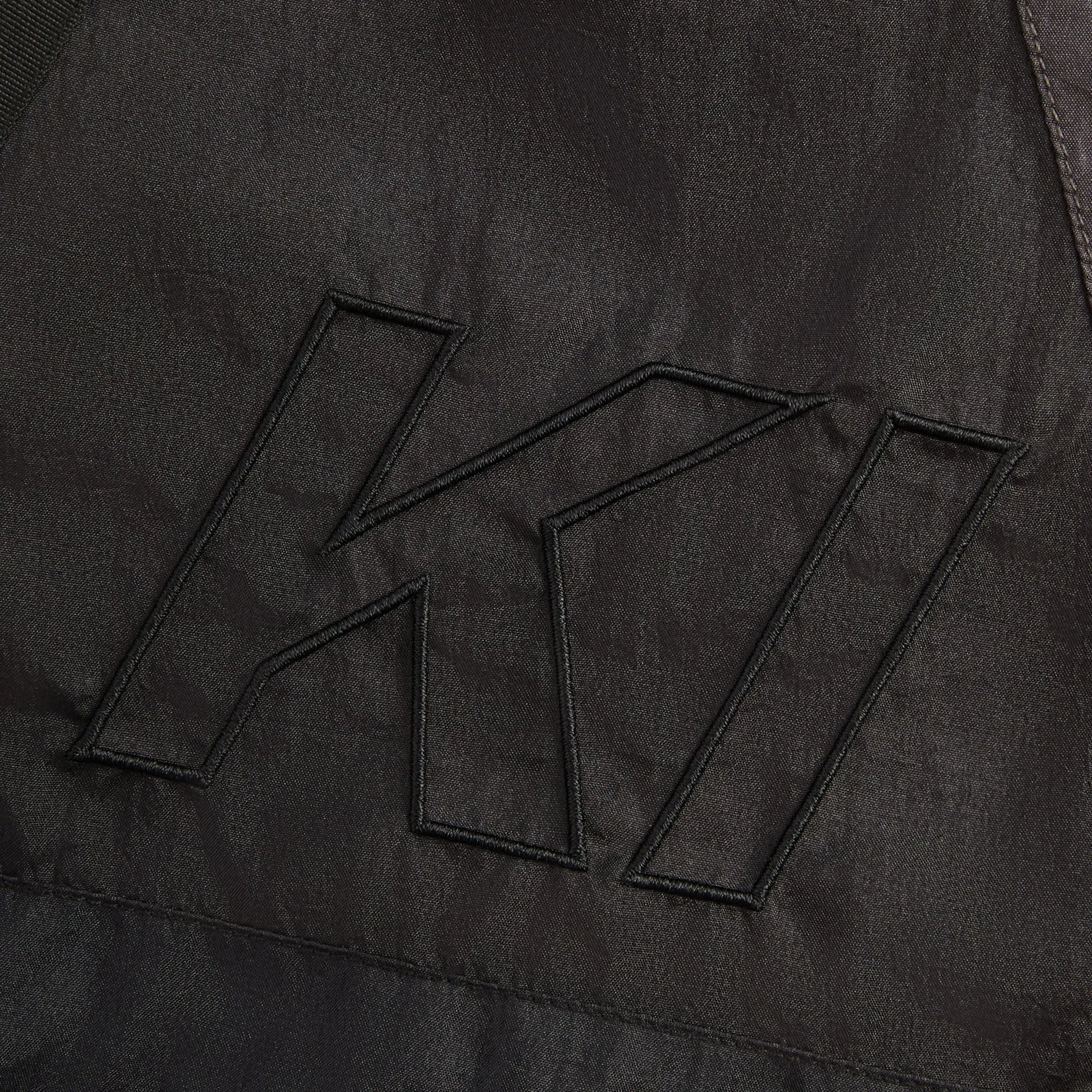 Detailed Logo View of Kith Washed Turbo Black Shorts KHM060983-001