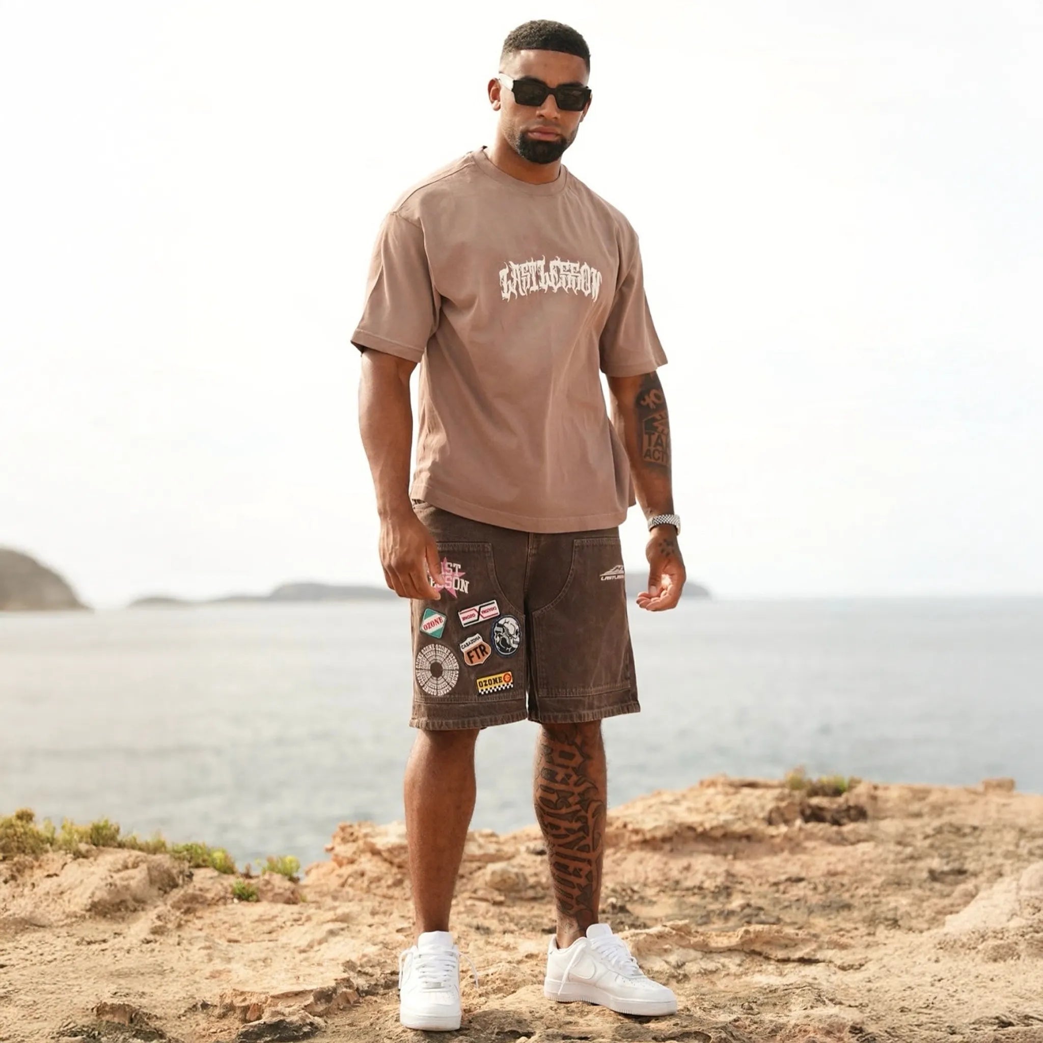 Front View of Last Lesson Script Brown T Shirt