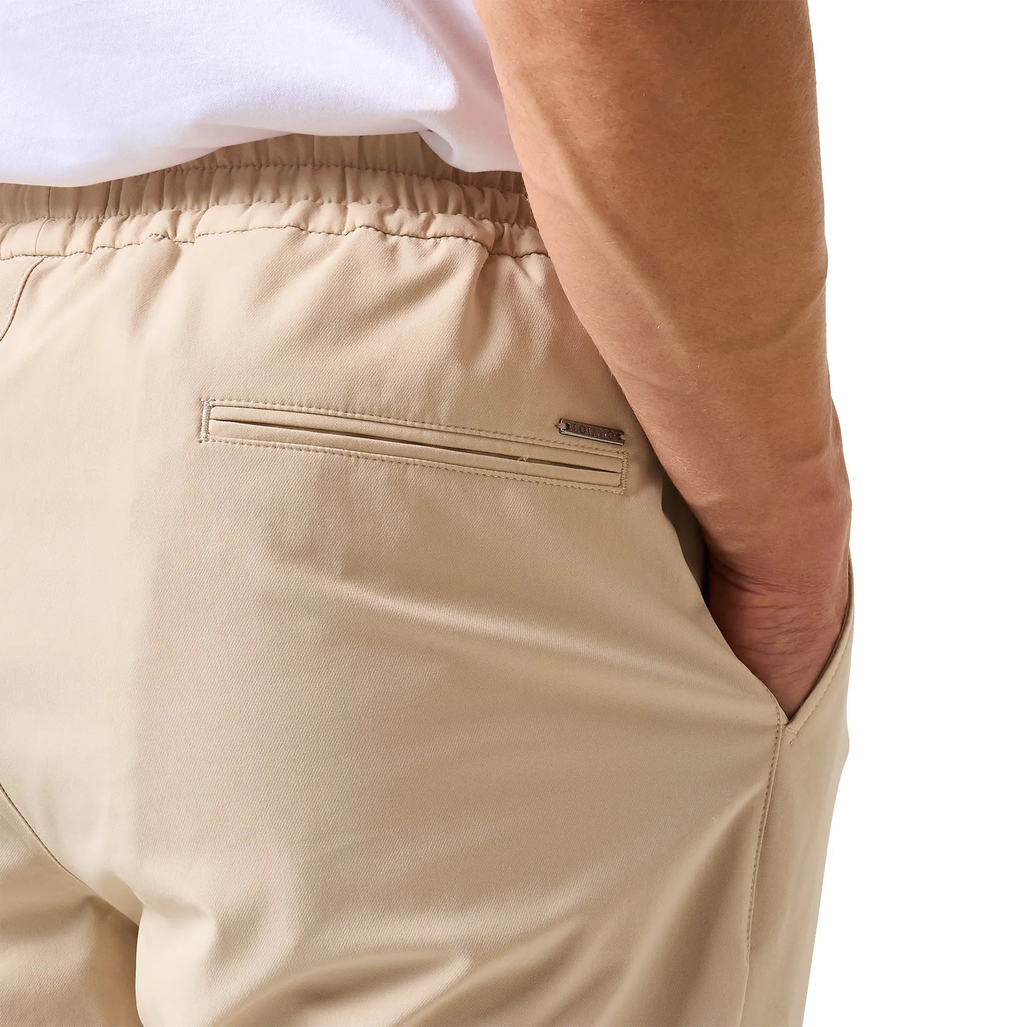 Detailed Back View of Loiano Tech Beige Trousers