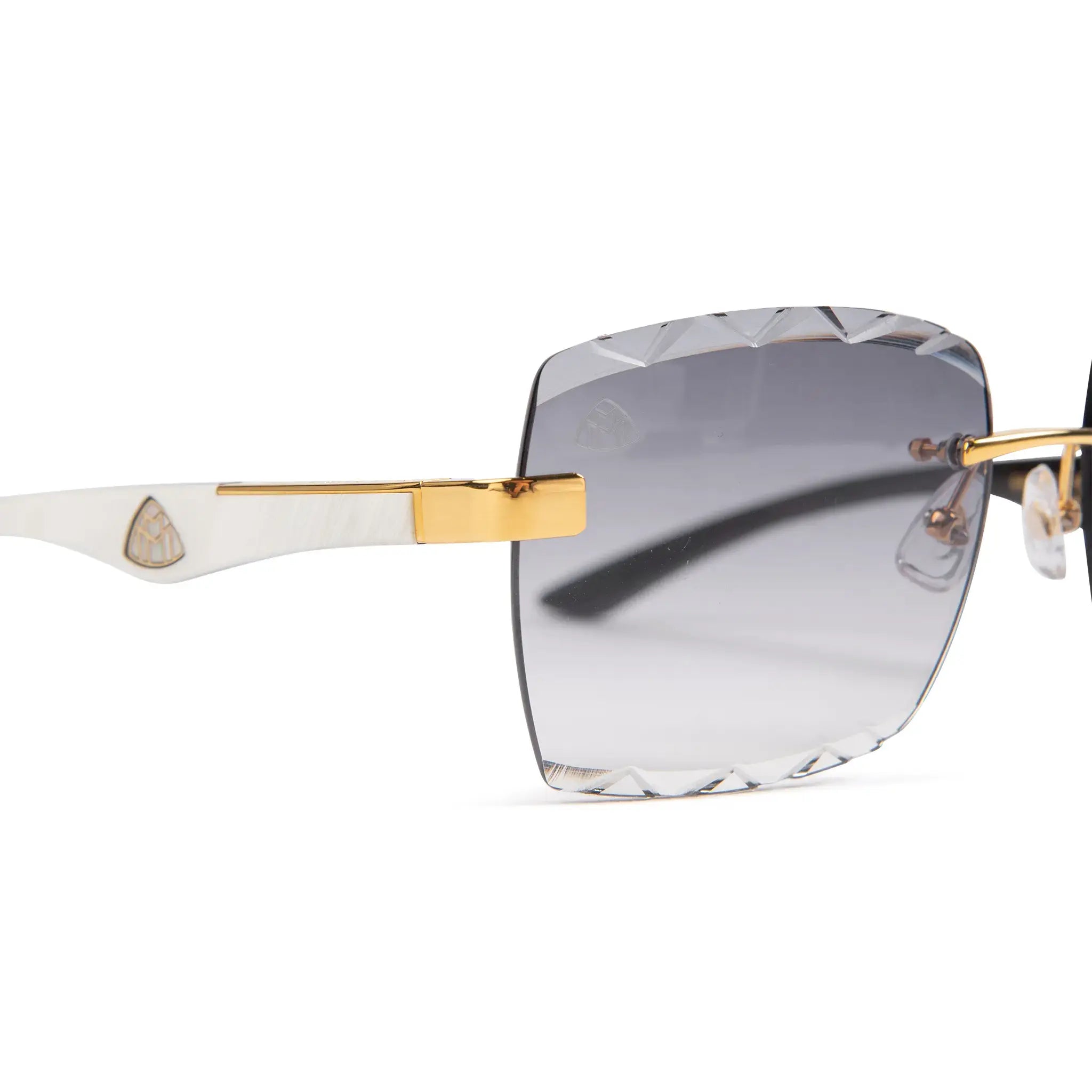 Lens view of Maybach Eyewear The Artist III G-HAS-ZZ5 Custom Gold Grey Fade Diamond Cut Sunglasses