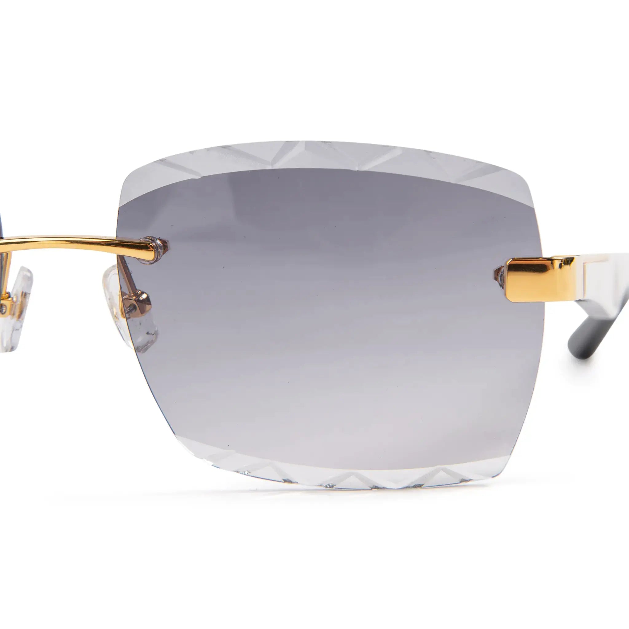 Lens view of Maybach Eyewear The Artist III G-HAS-ZZ5 Custom Gold Grey Fade Diamond Cut Sunglasses