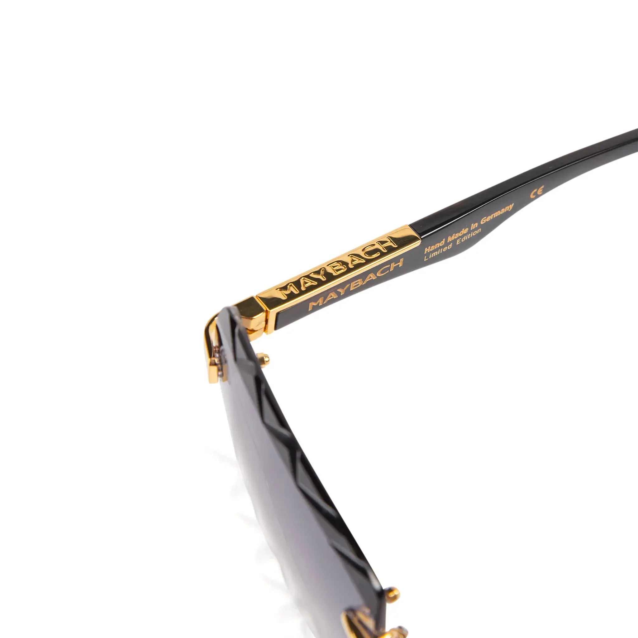 Top view of Maybach Eyewear The Artist III G-HAS-ZZ5 Custom Gold Grey Fade Diamond Cut Sunglasses