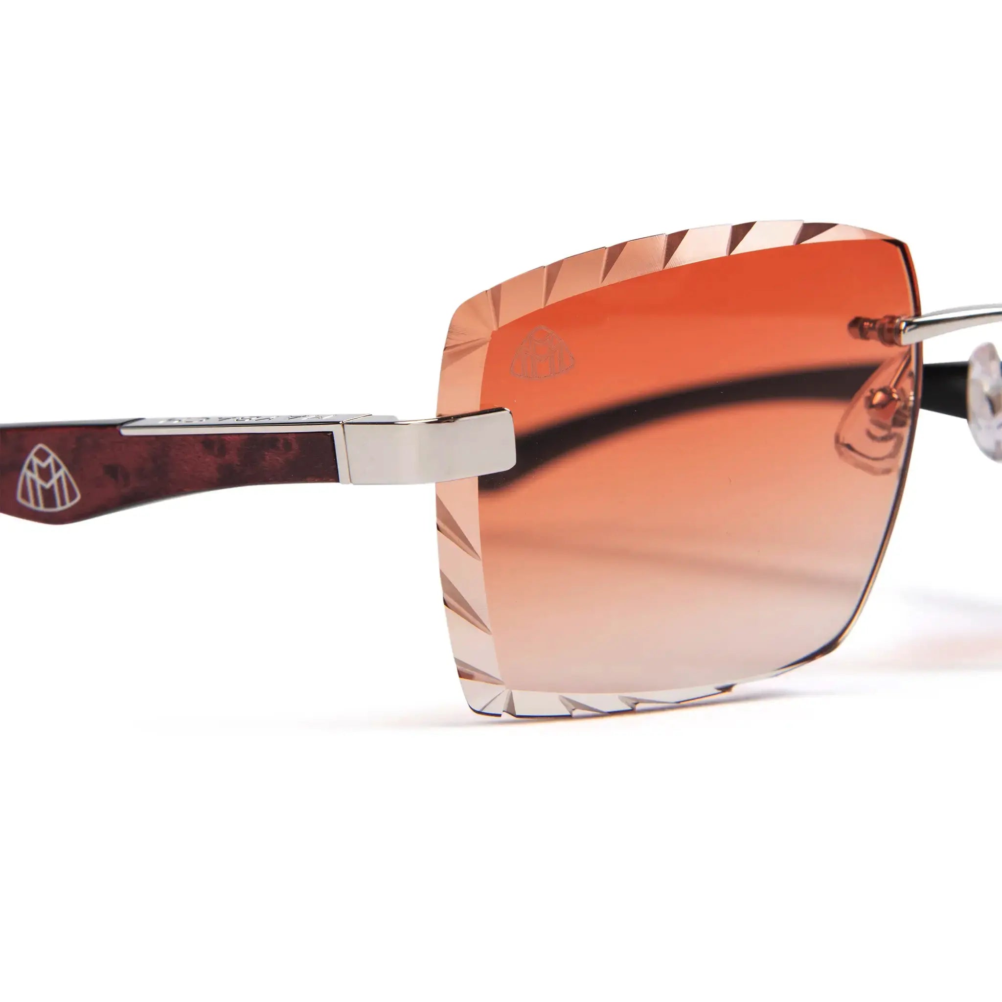 Corner view of Maybach Eyewear The Artist III P-WBZ-ZZ5 Custom Brown Fade Diamond Cut Sunglasses