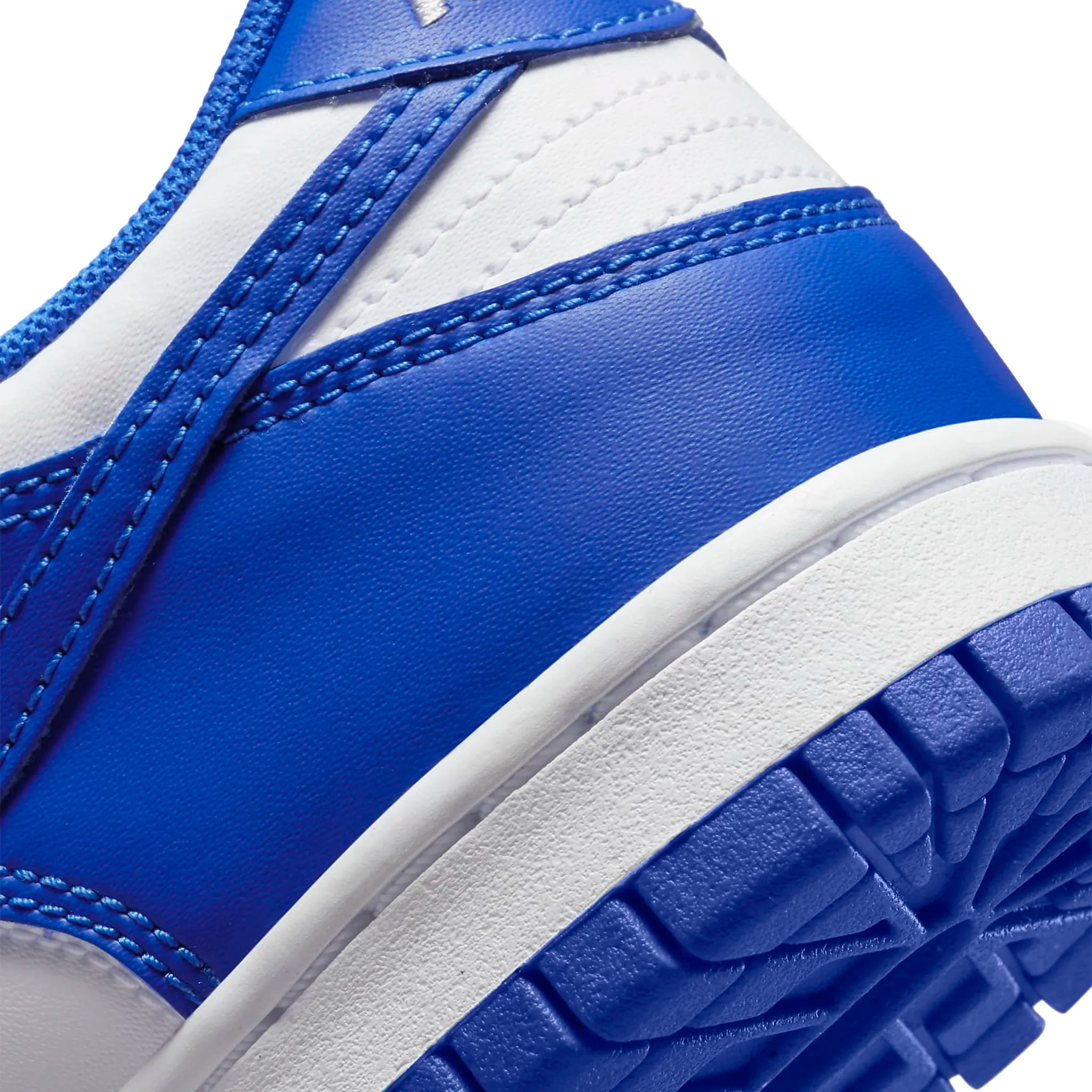 Heel view of Nike Dunk Low Racer Blue (GS) DV7067-400