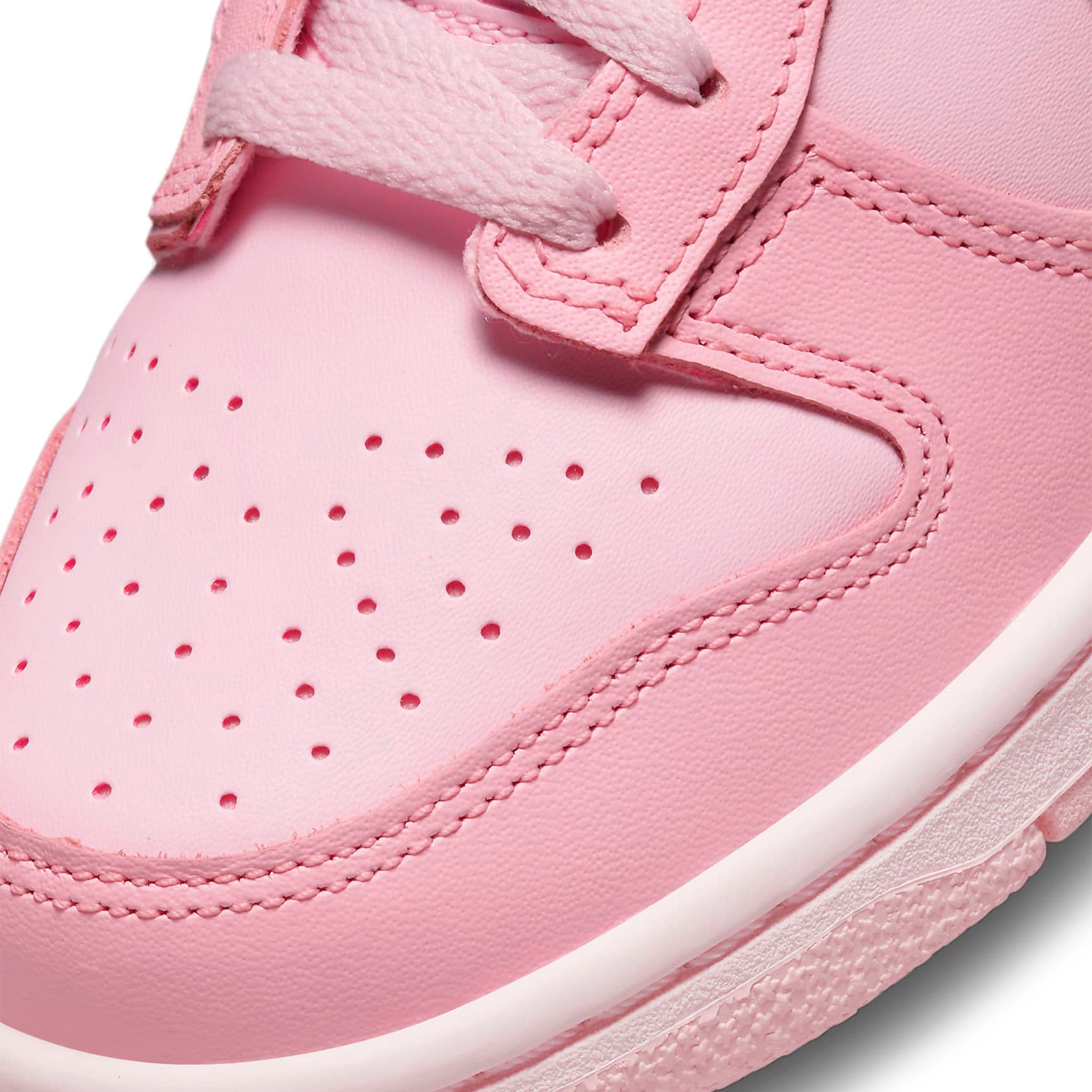 Toe box view of Nike Dunk Low Triple Pink (GS) DH9765-600