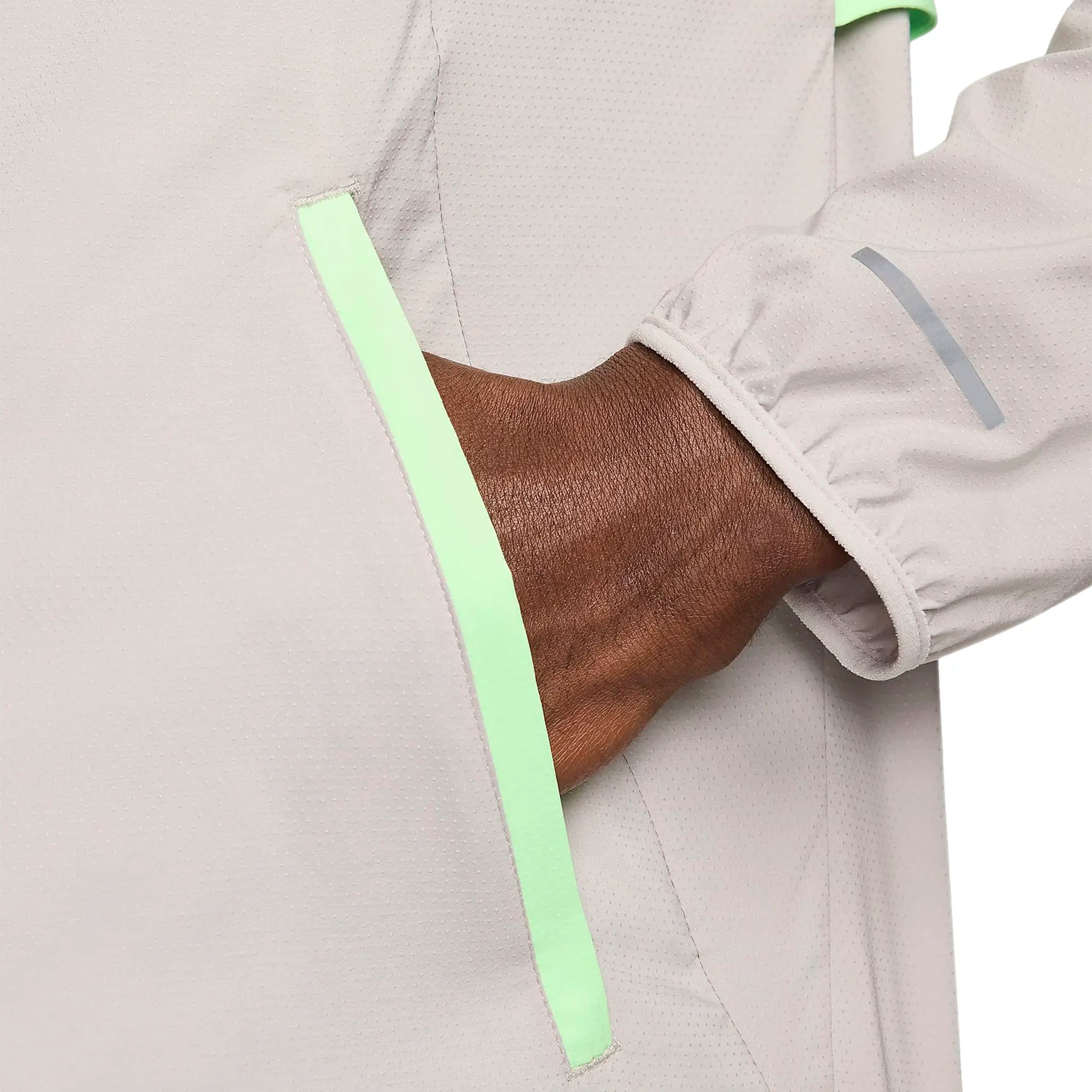 Pocket view of Nike Repel Packable Vapour Green Light Iron Ore Windrunner Jacket FB7541-376