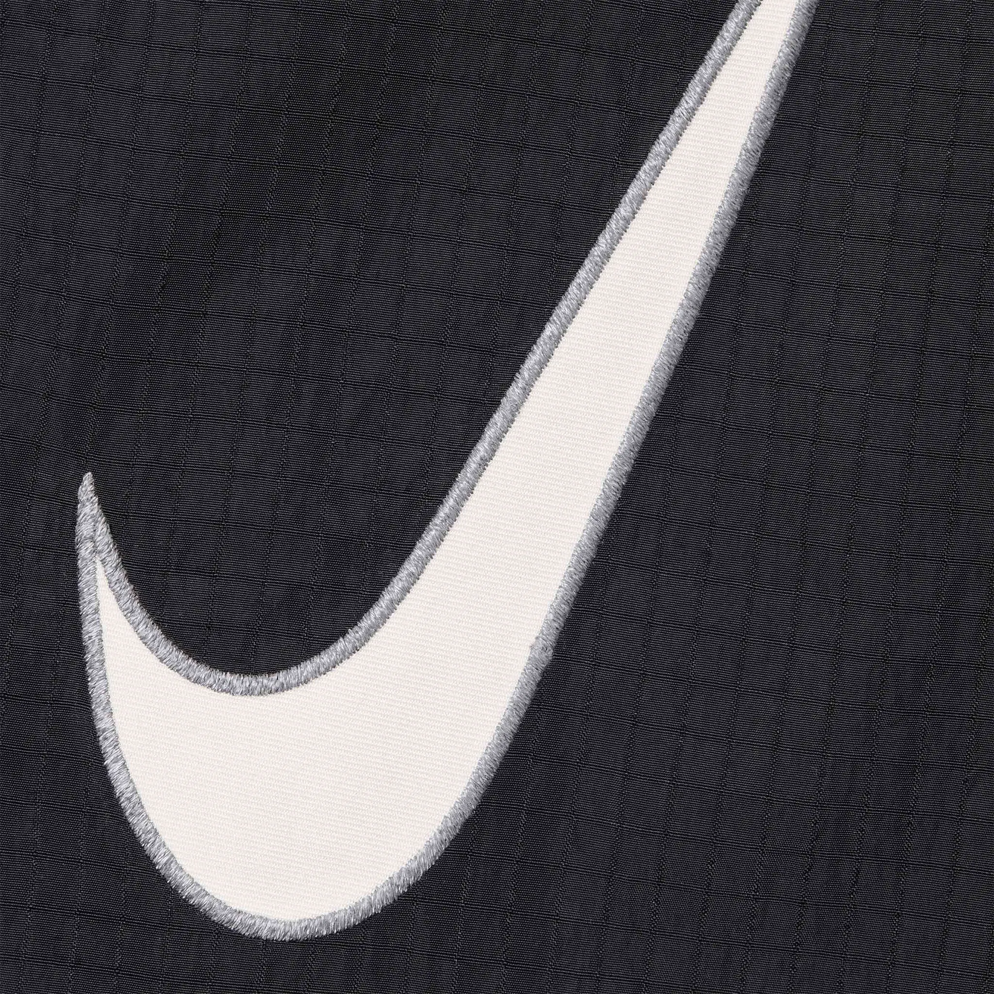 Detail view of Nike Supreme Ripstop Black Track Pants